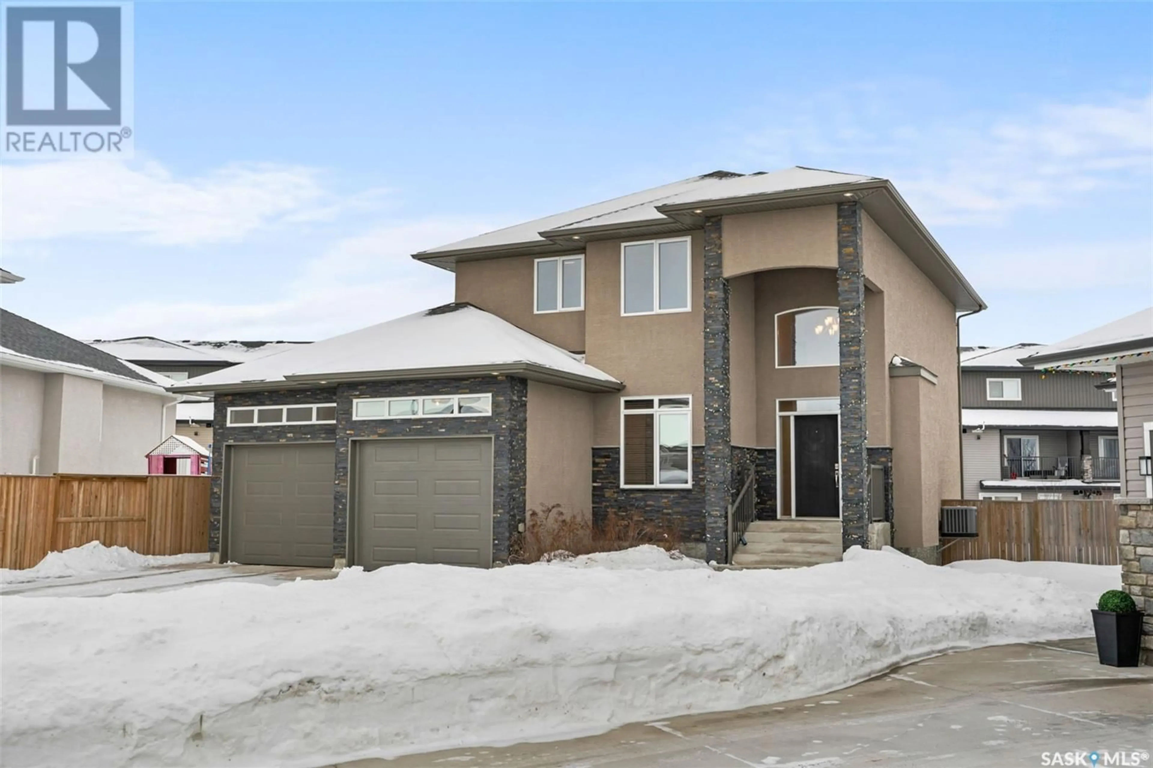 Home with brick exterior material, street for 526 Baltzan BAY, Saskatoon Saskatchewan S7W0S1