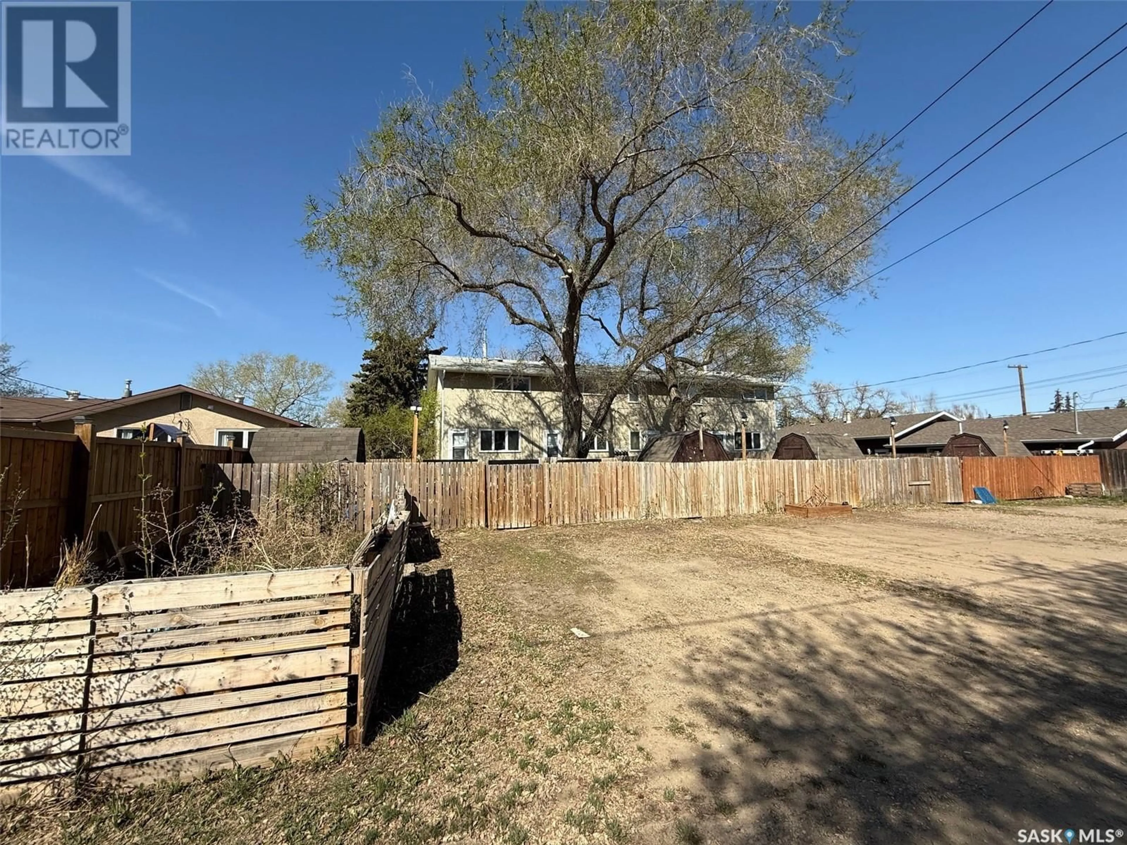 A pic from outside/outdoor area/front of a property/back of a property/a pic from drone, street for 1372 - 1382 108TH STREET, North Battleford Saskatchewan S9A3J8