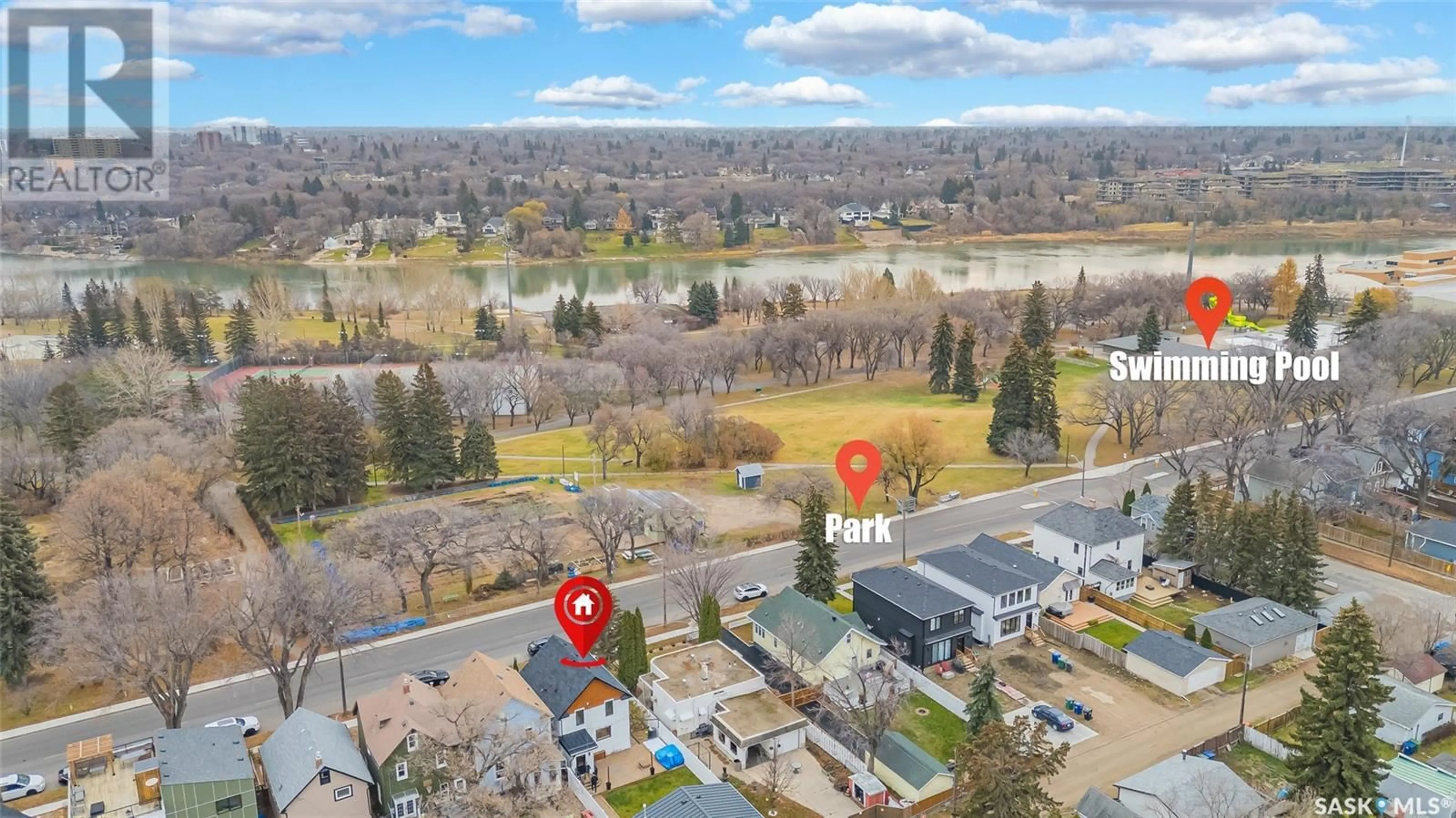 A pic from outside/outdoor area/front of a property/back of a property/a pic from drone, unknown for 719 H AVENUE S, Saskatoon Saskatchewan S7M1X2