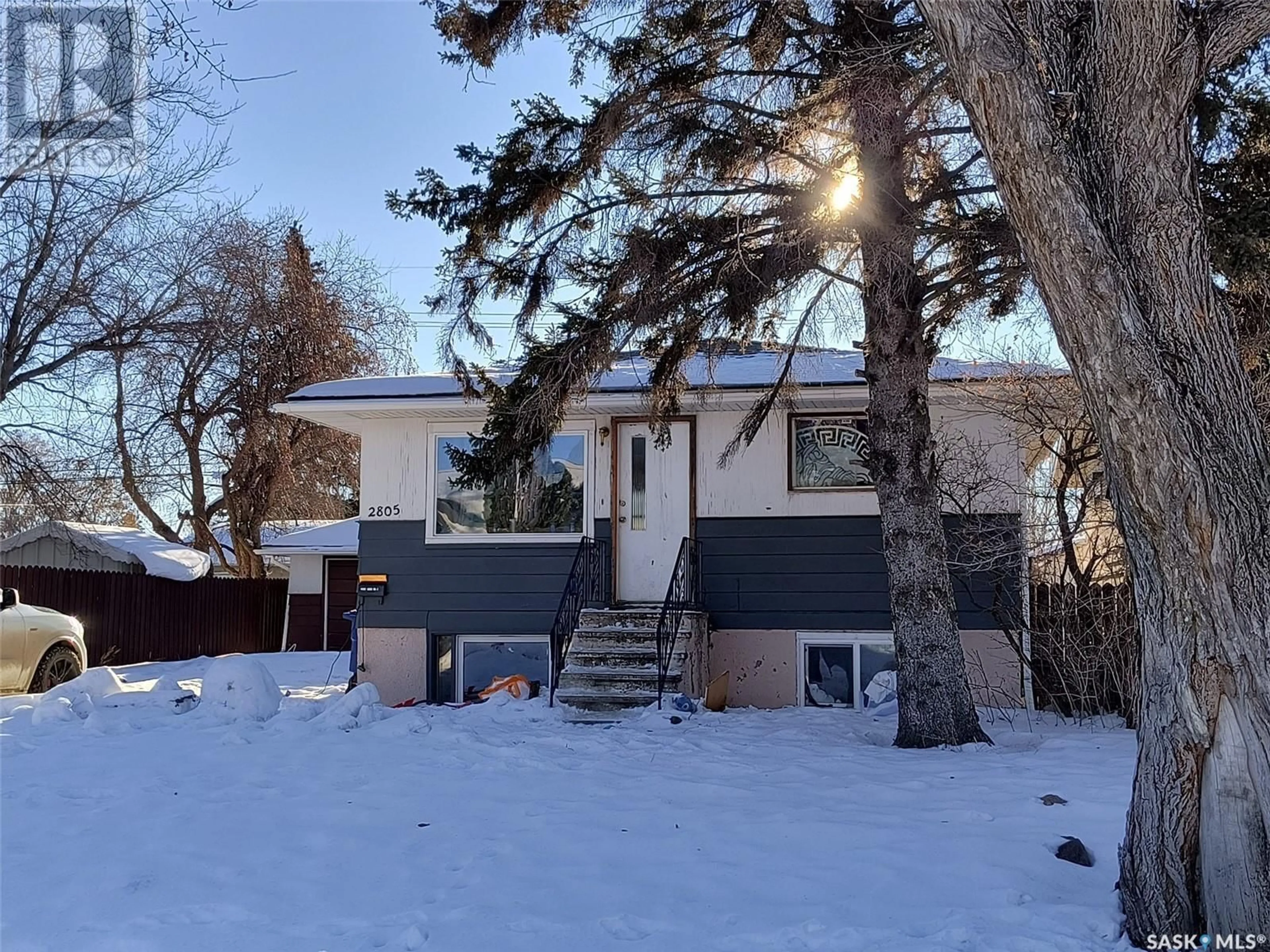 Home with vinyl exterior material, street for 2805 20TH STREET, Saskatoon Saskatchewan S7M1B9