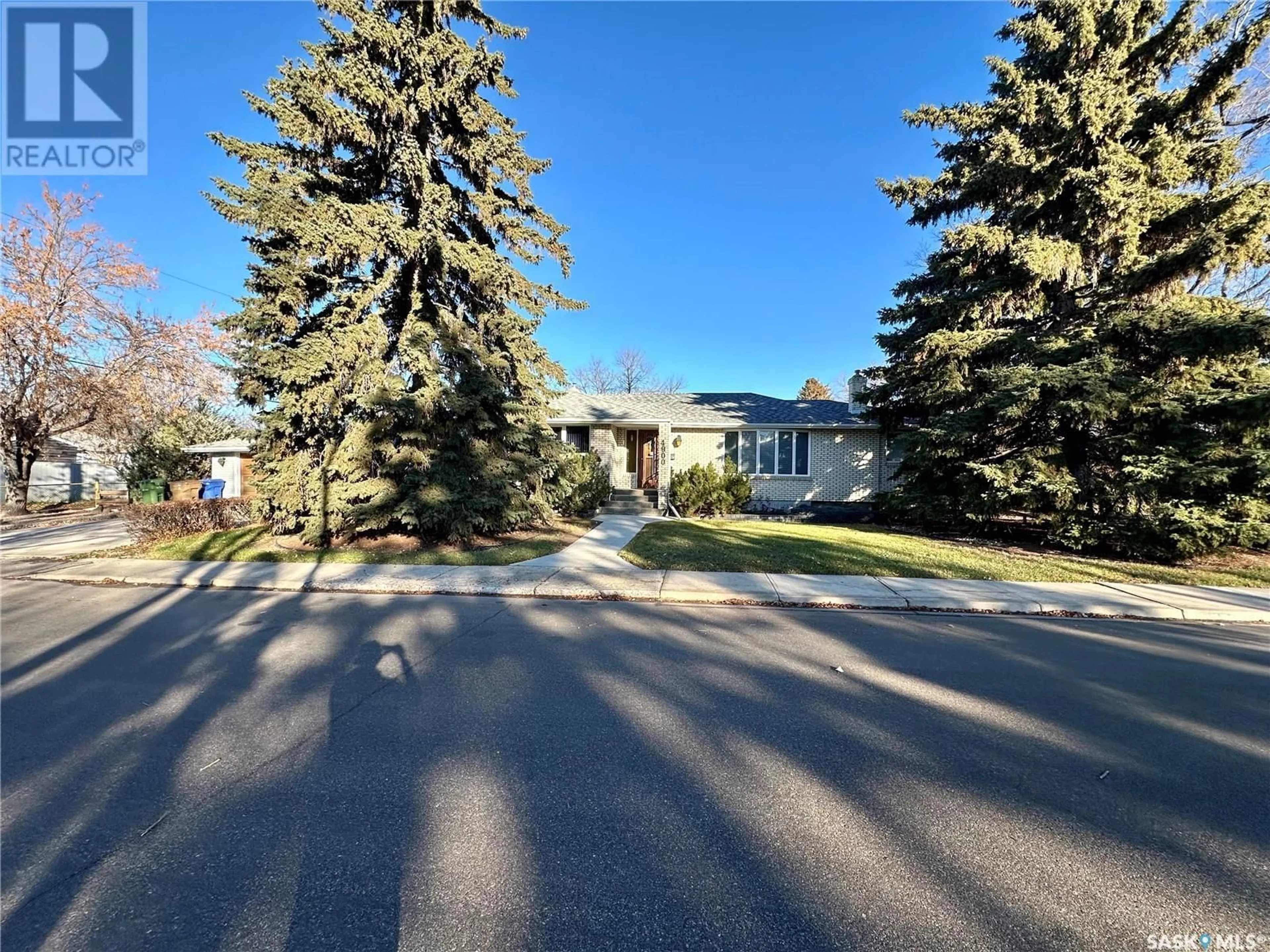 A pic from outside/outdoor area/front of a property/back of a property/a pic from drone, street for 4900 2nd AVENUE, Regina Saskatchewan S4T0B6