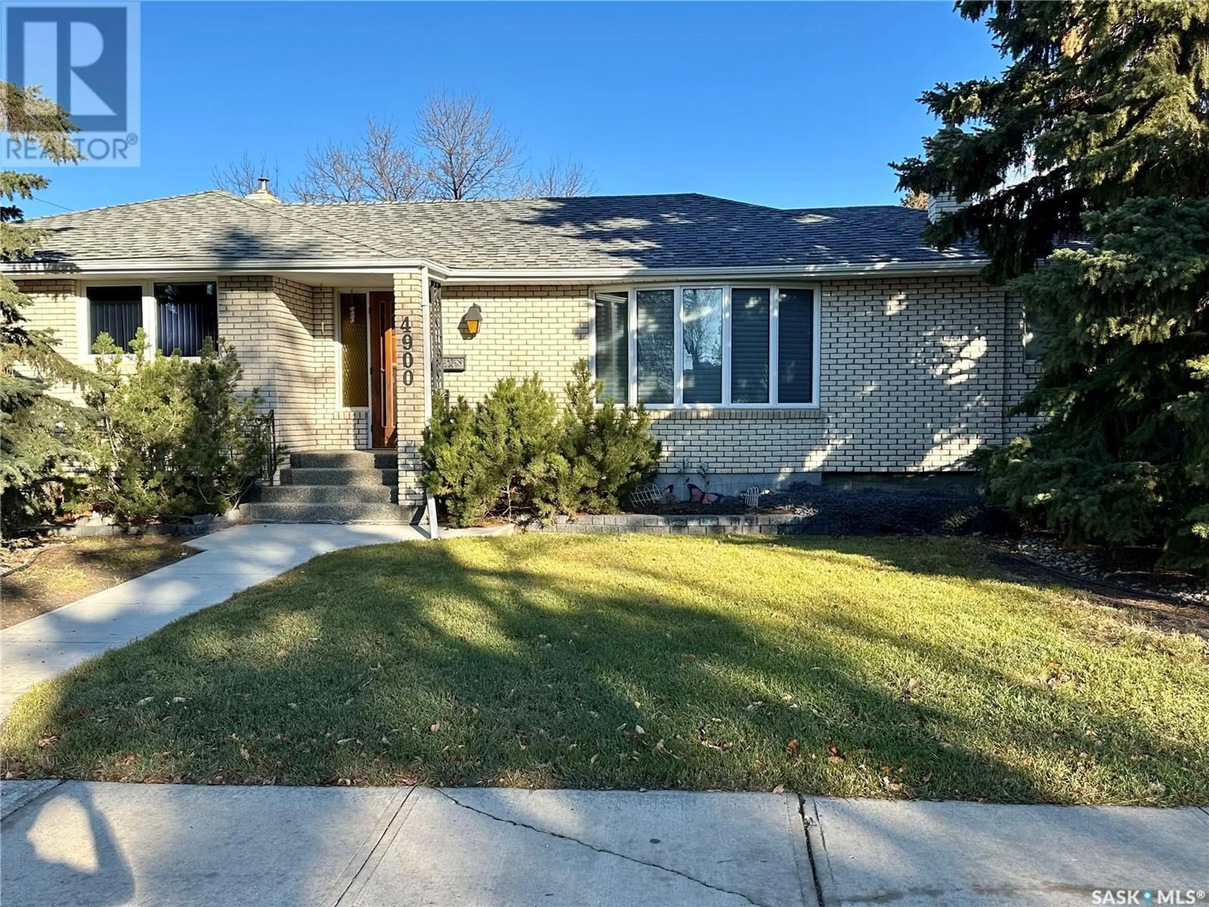 Home with brick exterior material, street for 4900 2nd AVENUE, Regina Saskatchewan S4T0B6