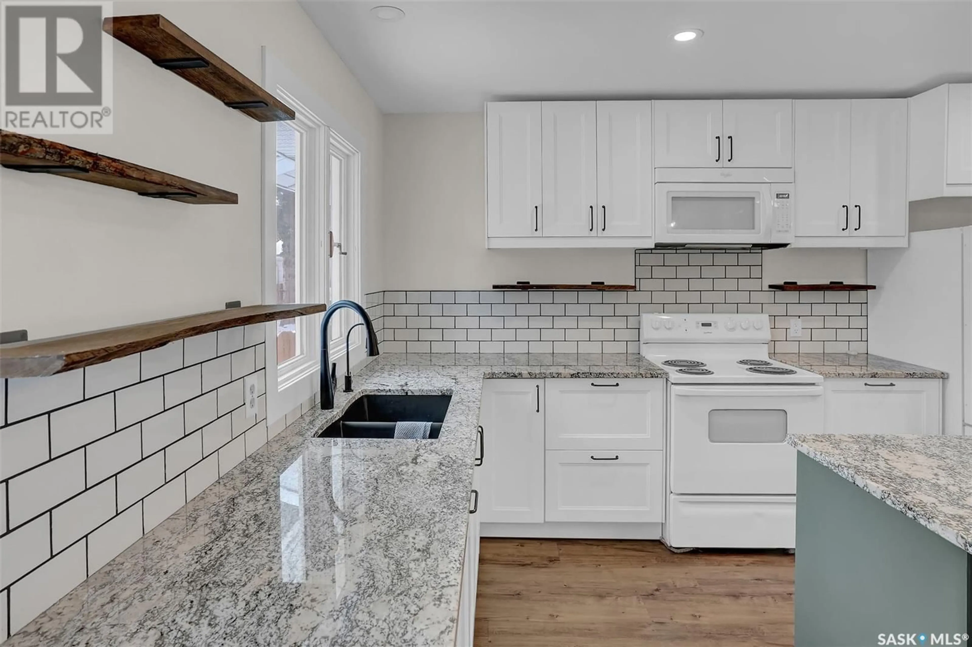 Open concept kitchen, ceramic/tile floor for 219 Michener DRIVE, Regina Saskatchewan S4V0J3