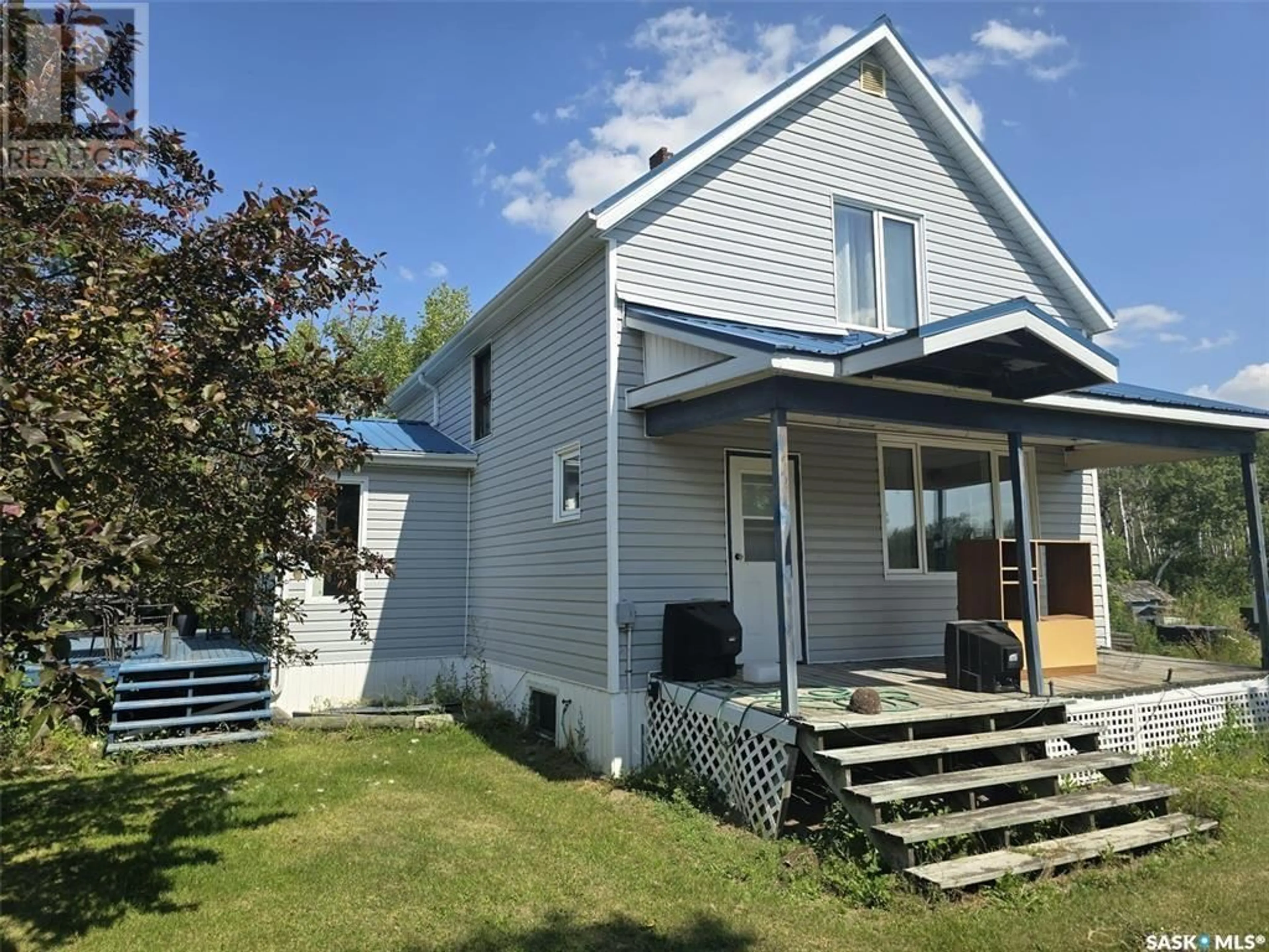 Home with vinyl exterior material, street for Eskra Acreage, Elfros Rm No. 307 Saskatchewan S0A4T0