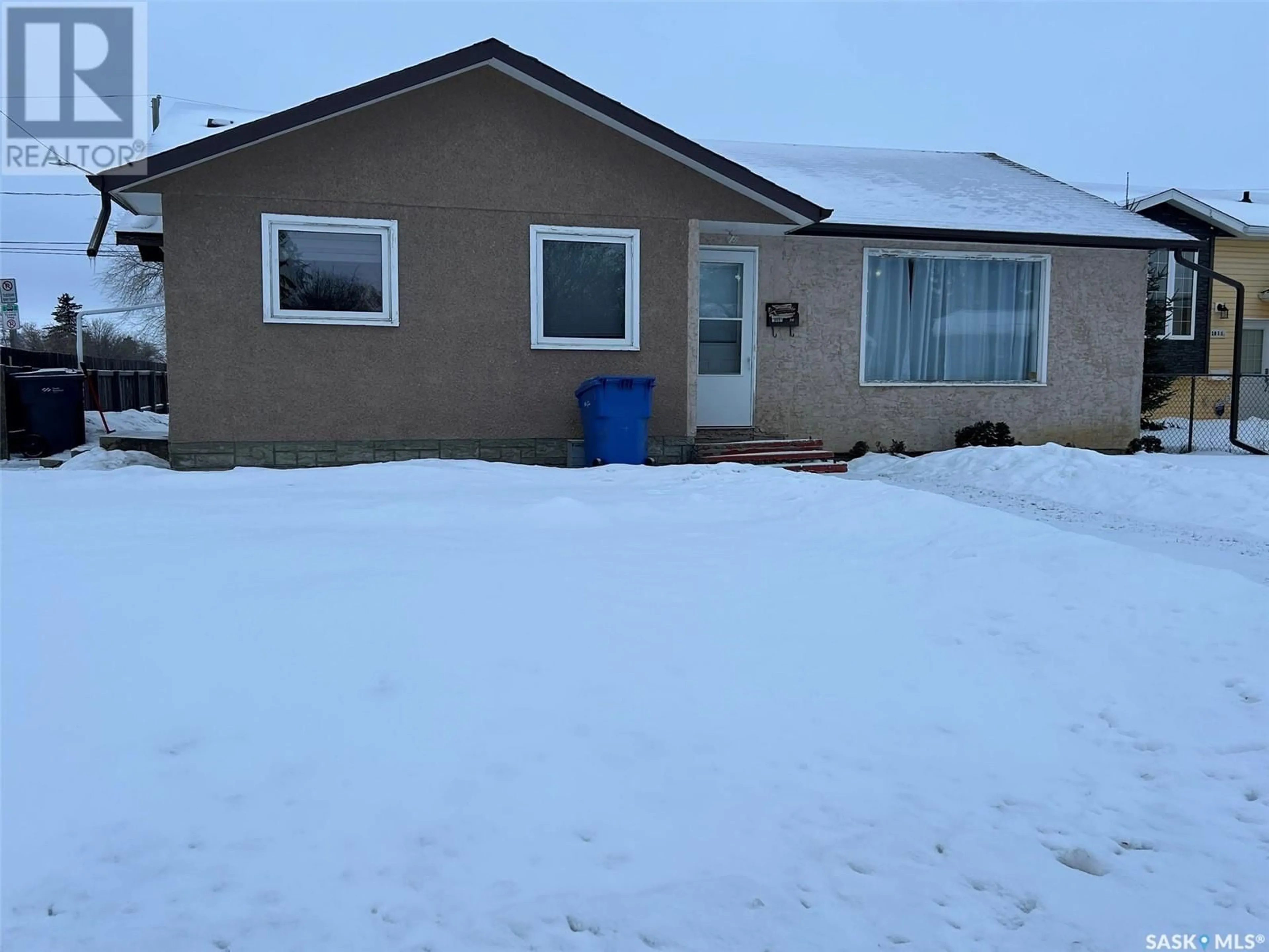 A pic from outside/outdoor area/front of a property/back of a property/a pic from drone, street for 1801 103rd STREET, North Battleford Saskatchewan S9A1M1