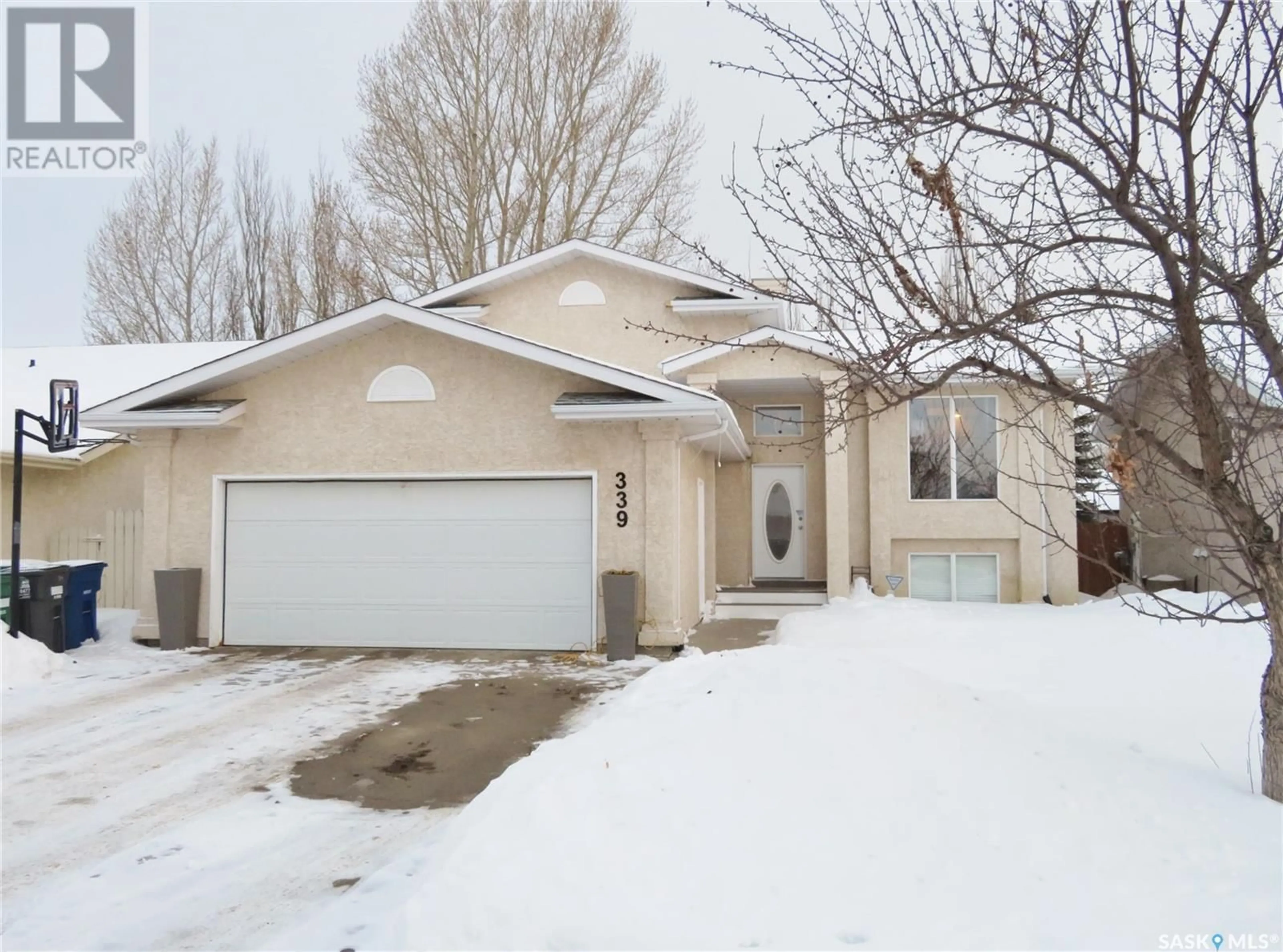 Home with vinyl exterior material, street for 339 Coben CRESCENT, Saskatoon Saskatchewan S7S1B5