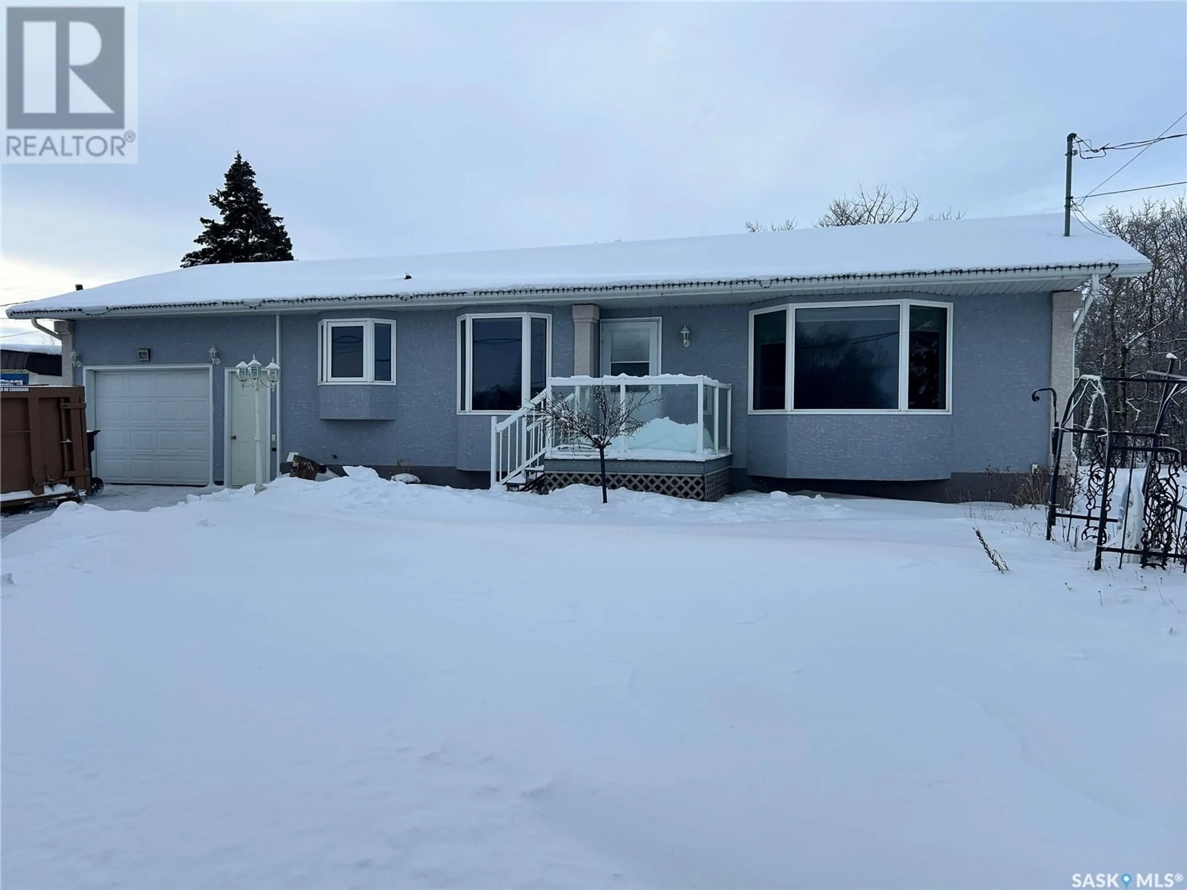 Home with vinyl exterior material, street for 1033 Kaiser William AVENUE, Langenburg Saskatchewan S0A2A0