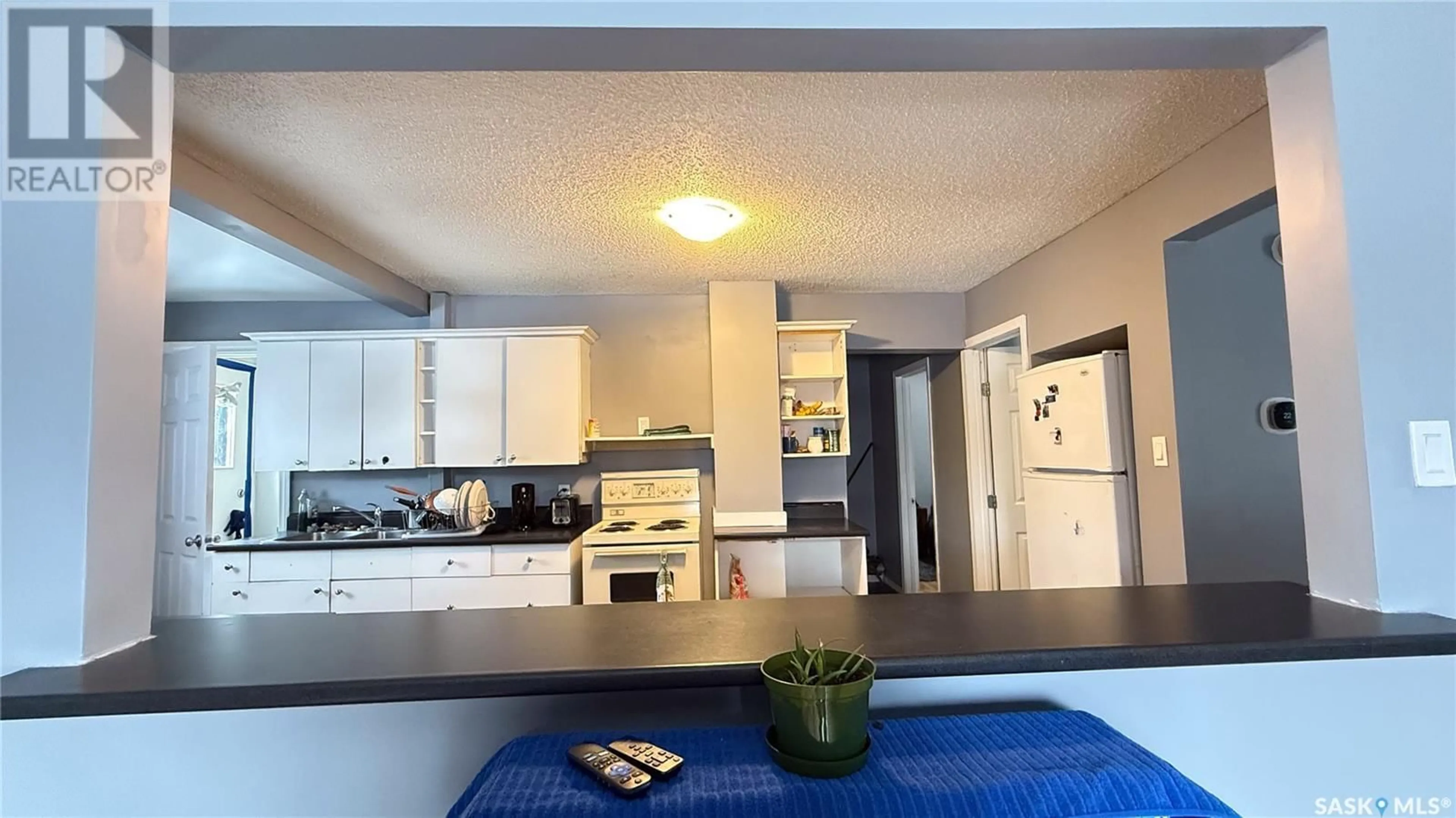 Open concept kitchen, unknown for 1271 107th STREET, North Battleford Saskatchewan S9A1Z4