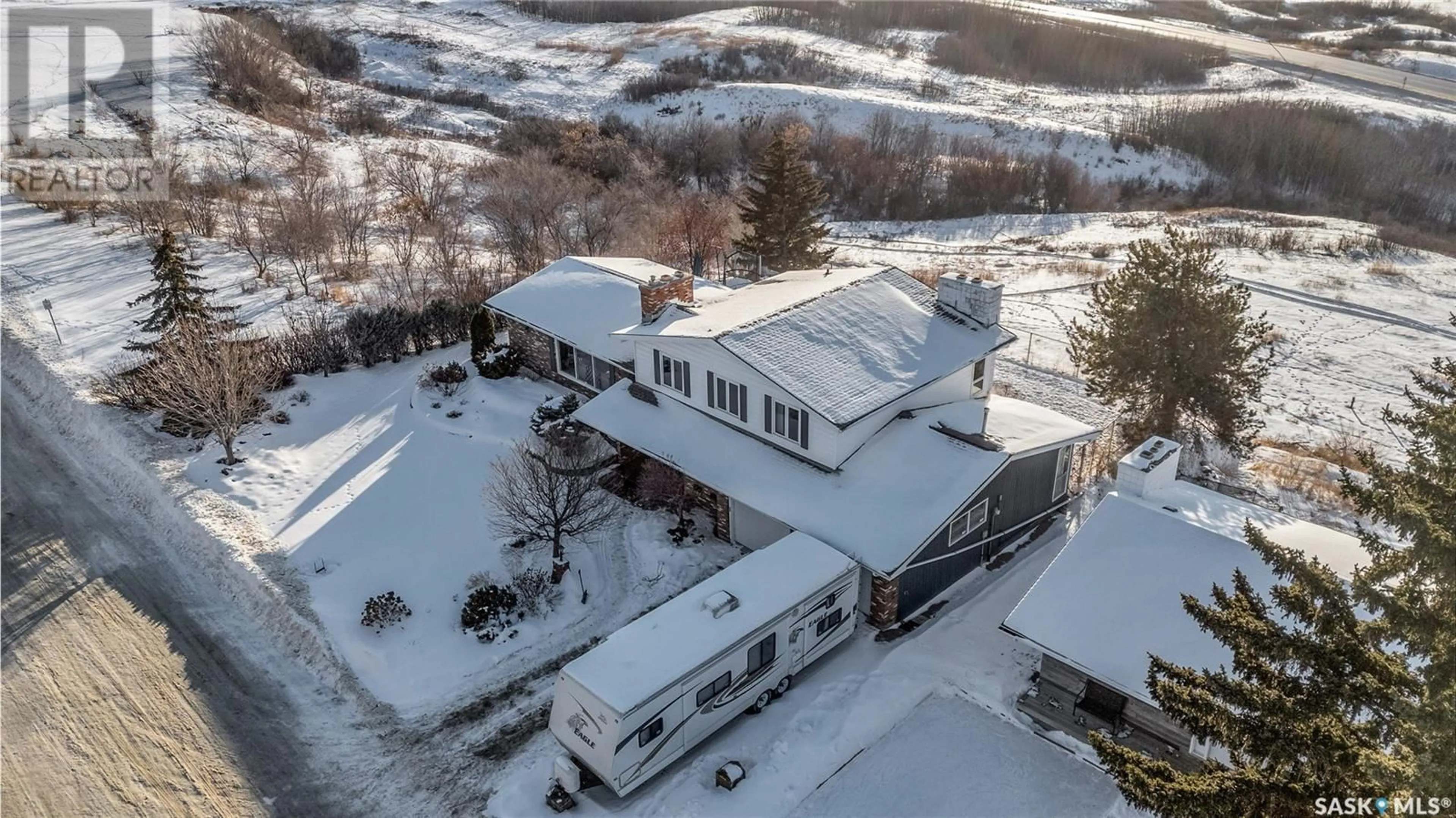 A pic from outside/outdoor area/front of a property/back of a property/a pic from drone, building for 10008 5th AVENUE, North Battleford Saskatchewan S9A2N2