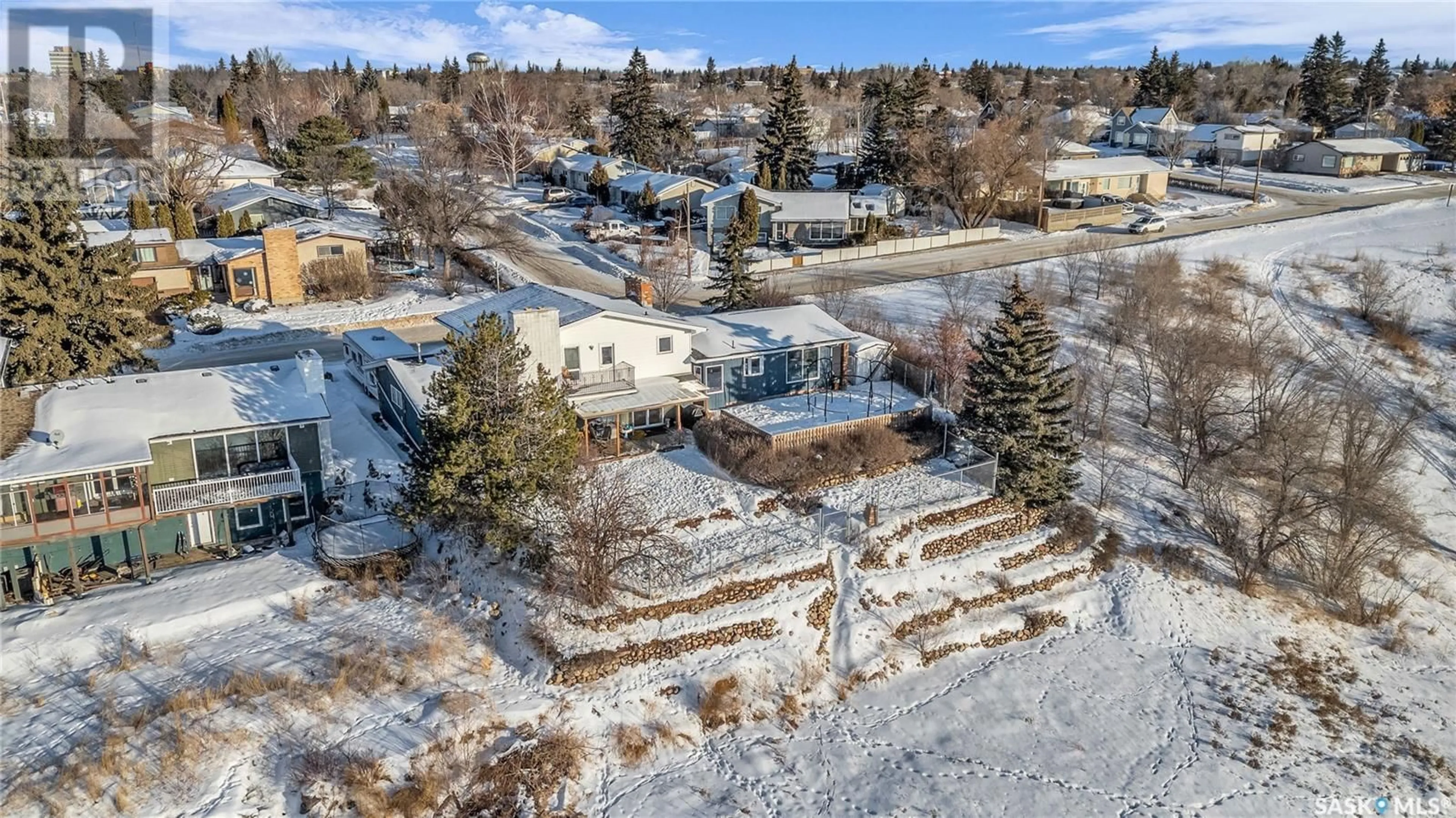 A pic from outside/outdoor area/front of a property/back of a property/a pic from drone, street for 10008 5th AVENUE, North Battleford Saskatchewan S9A2N2