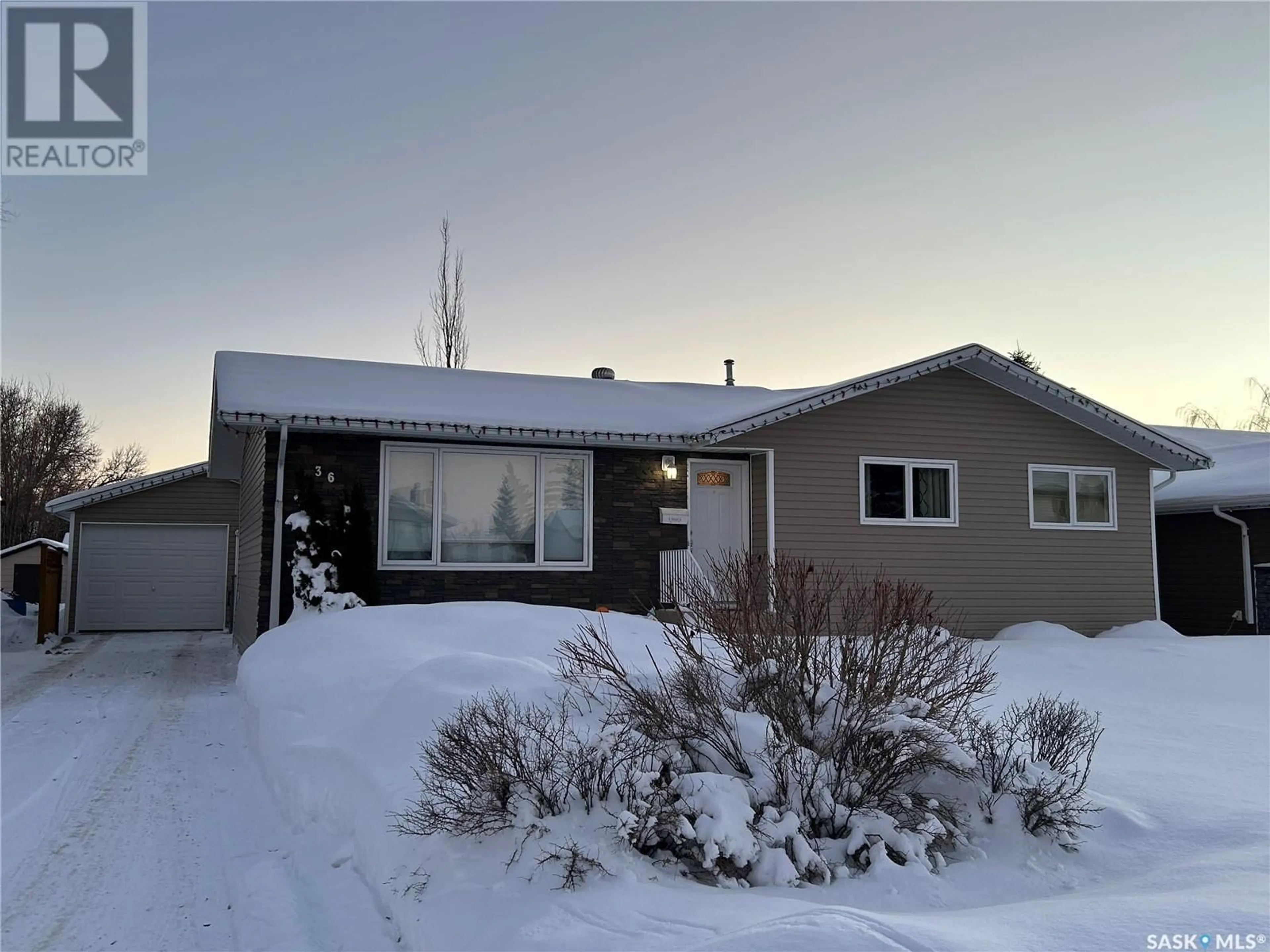 Home with vinyl exterior material, street for 36 Centennial CRESCENT, Humboldt Saskatchewan S0K2A0