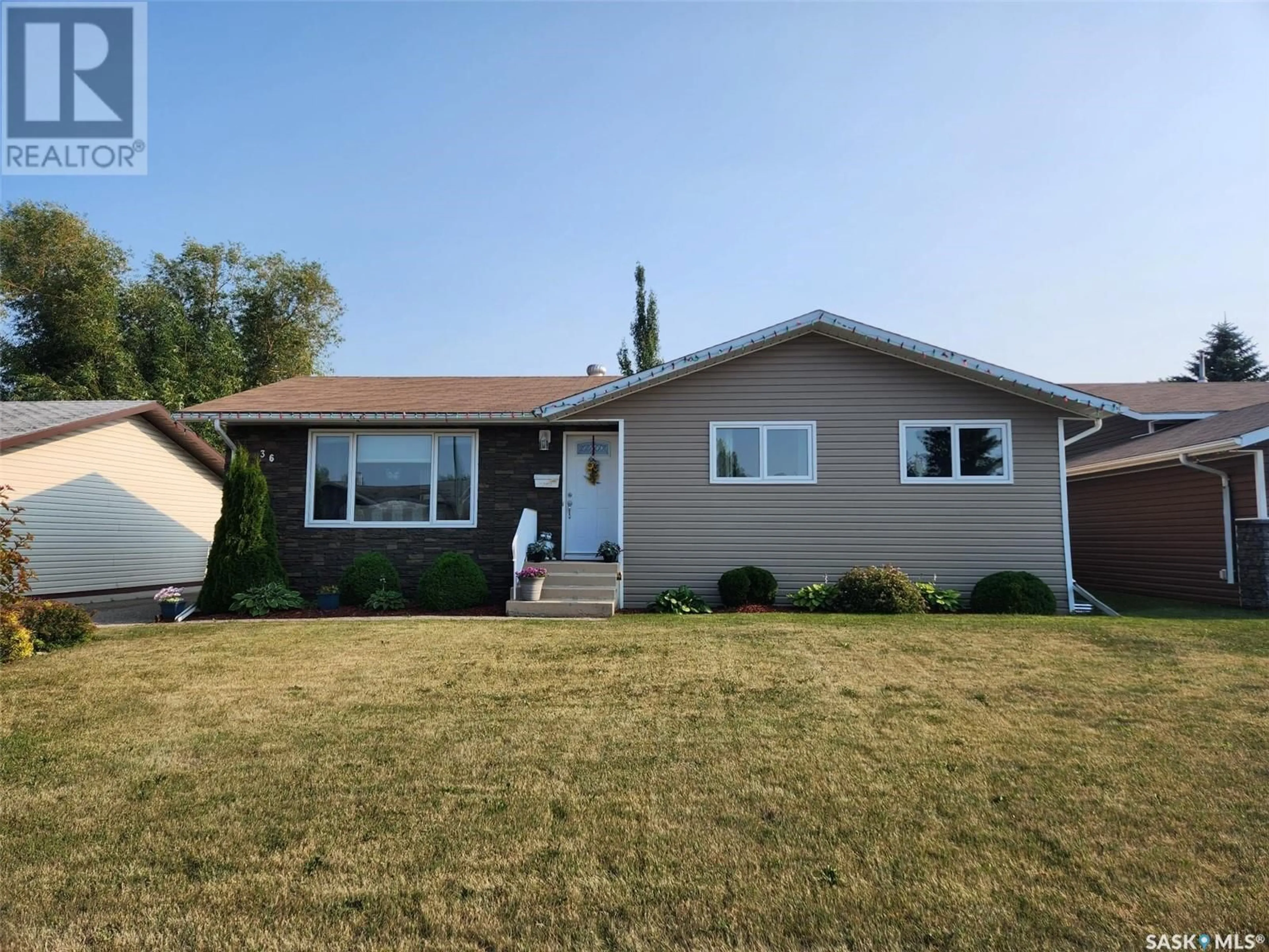 Home with vinyl exterior material, street for 36 Centennial CRESCENT, Humboldt Saskatchewan S0K2A0