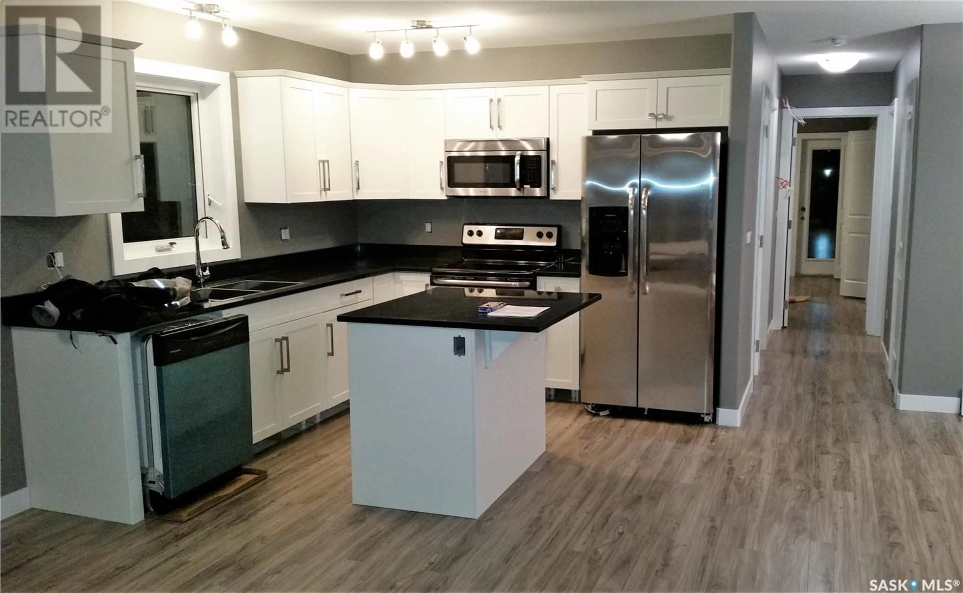 Open concept kitchen, unknown for 463 Kloppenburg STREET, Saskatoon Saskatchewan S7W0N8