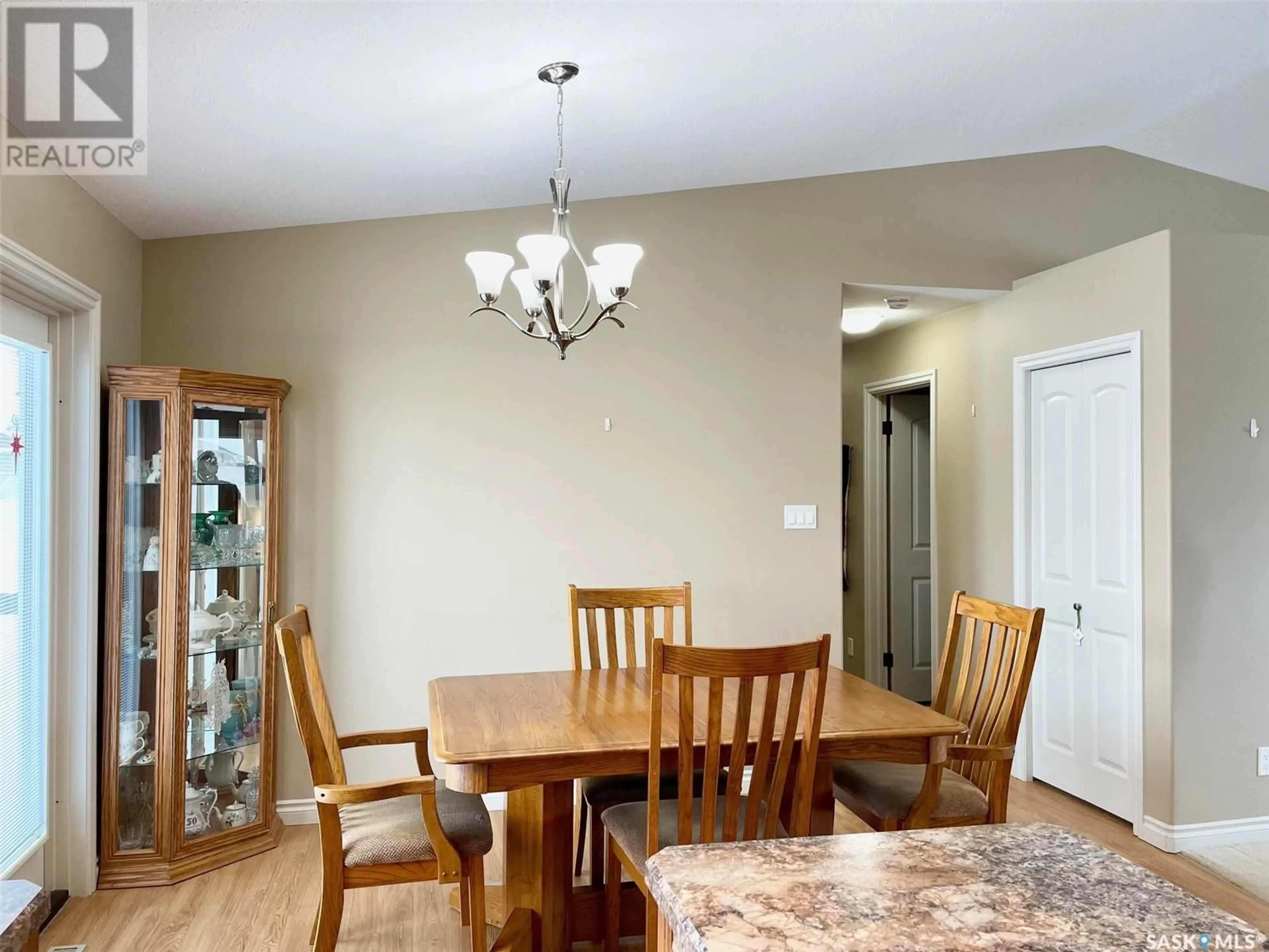 Dining room, wood/laminate floor for 170 Good Spirit CRESCENT, Yorkton Saskatchewan S3N3J8