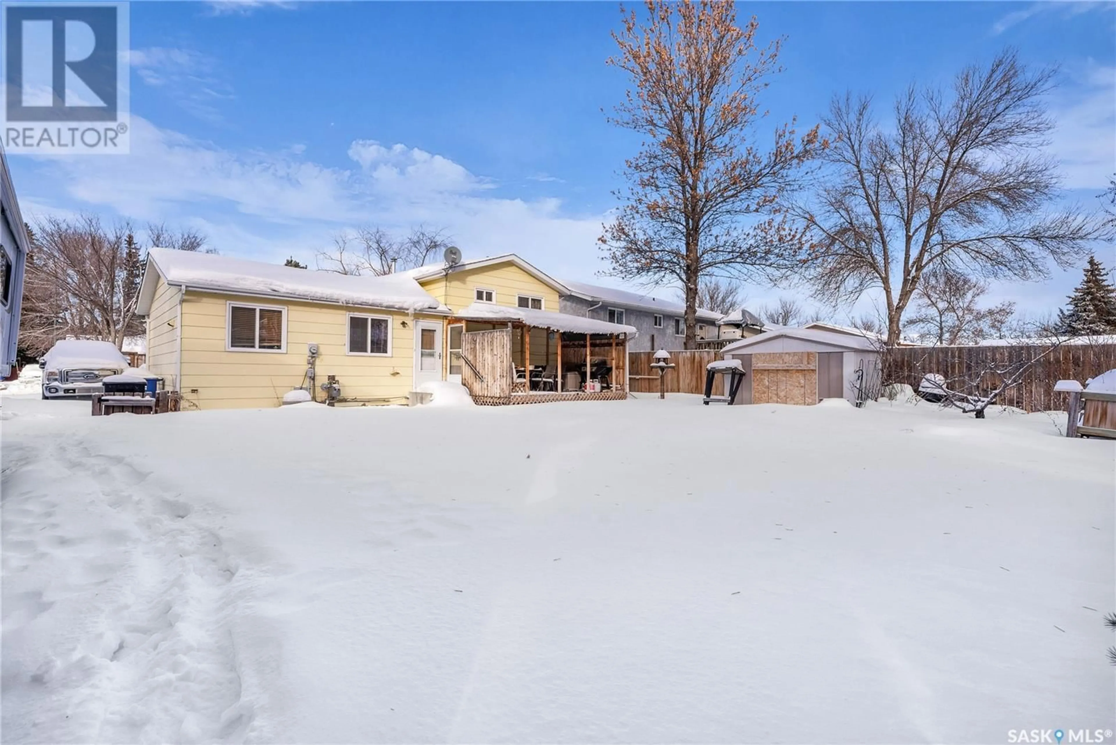 A pic from outside/outdoor area/front of a property/back of a property/a pic from drone, street for 3663 Fairlight DRIVE, Saskatoon Saskatchewan S7M4L7