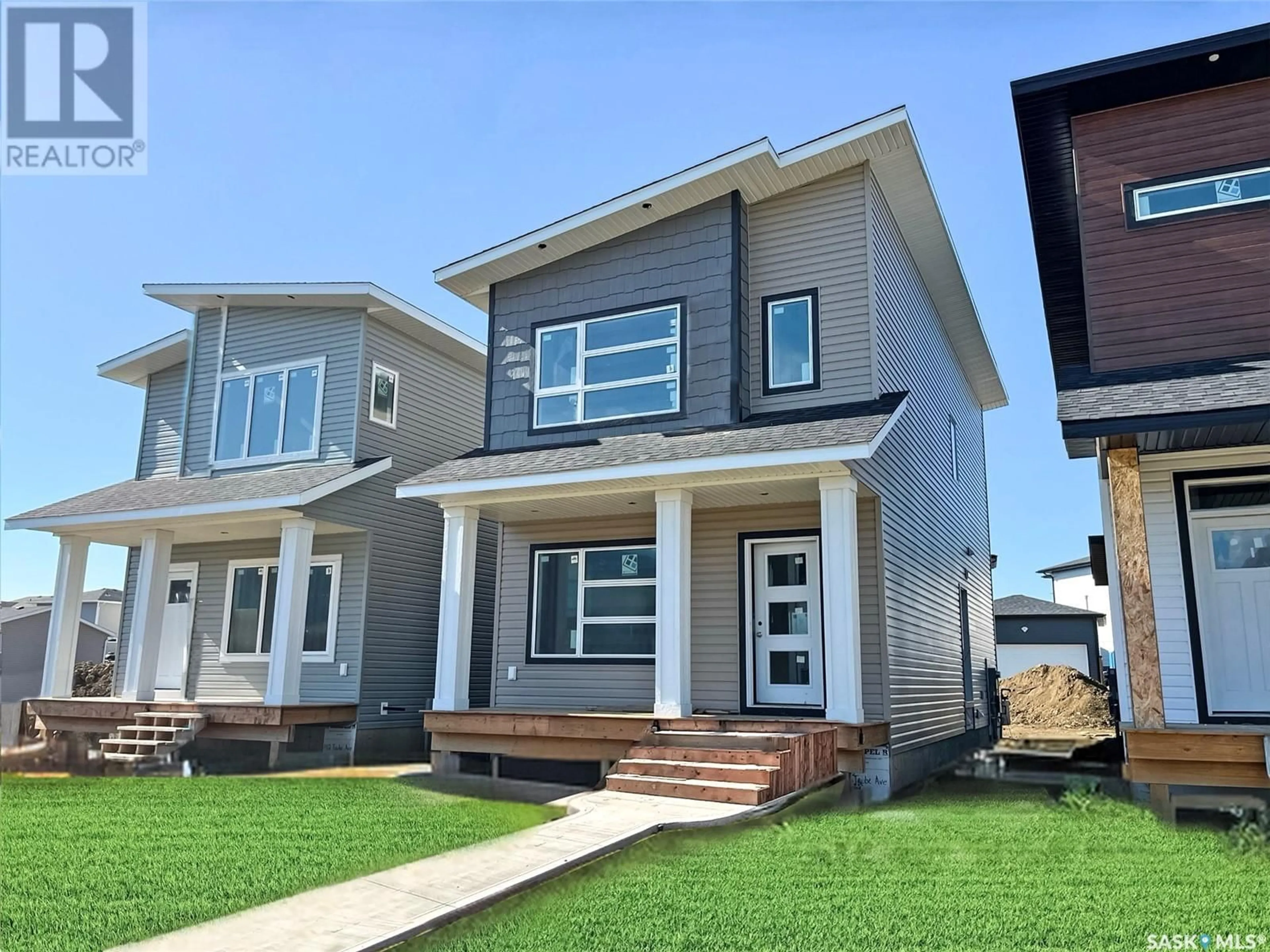 Home with vinyl exterior material, street for 138 Taube AVENUE, Saskatoon Saskatchewan S7V1L6