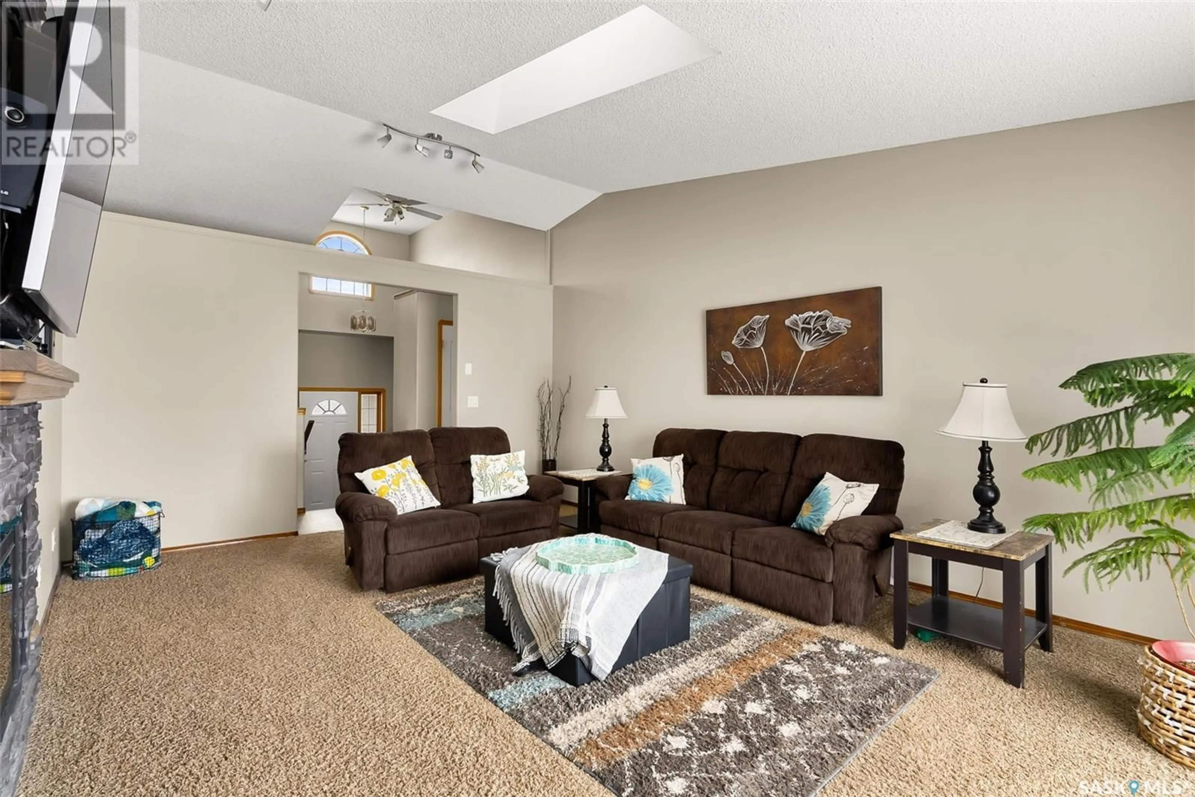 Living room with furniture, carpet floor for 3544 Canterbury PLACE E, Regina Saskatchewan S4V2T4