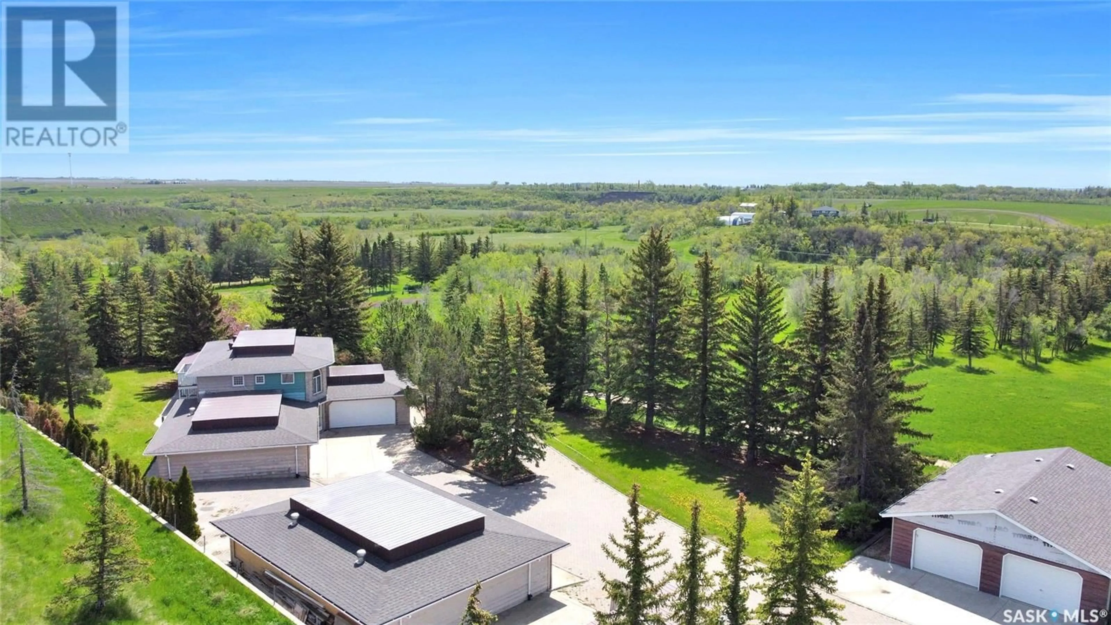 A pic from outside/outdoor area/front of a property/back of a property/a pic from drone, mountain view for 1055 7th AVENUE SW, Moose Jaw Saskatchewan S6H5R2