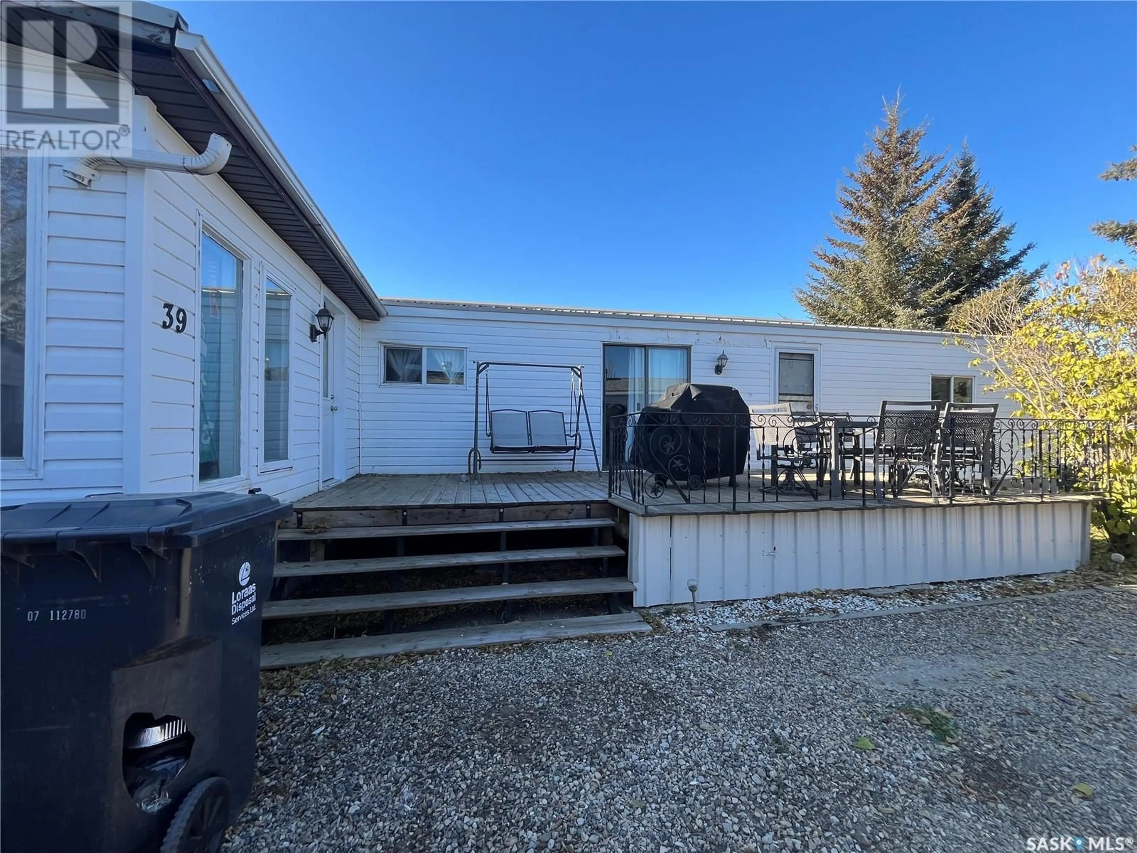 A pic from outside/outdoor area/front of a property/back of a property/a pic from drone, unknown for 39 Walters COURT, Pilot Butte Saskatchewan S0G3Z0