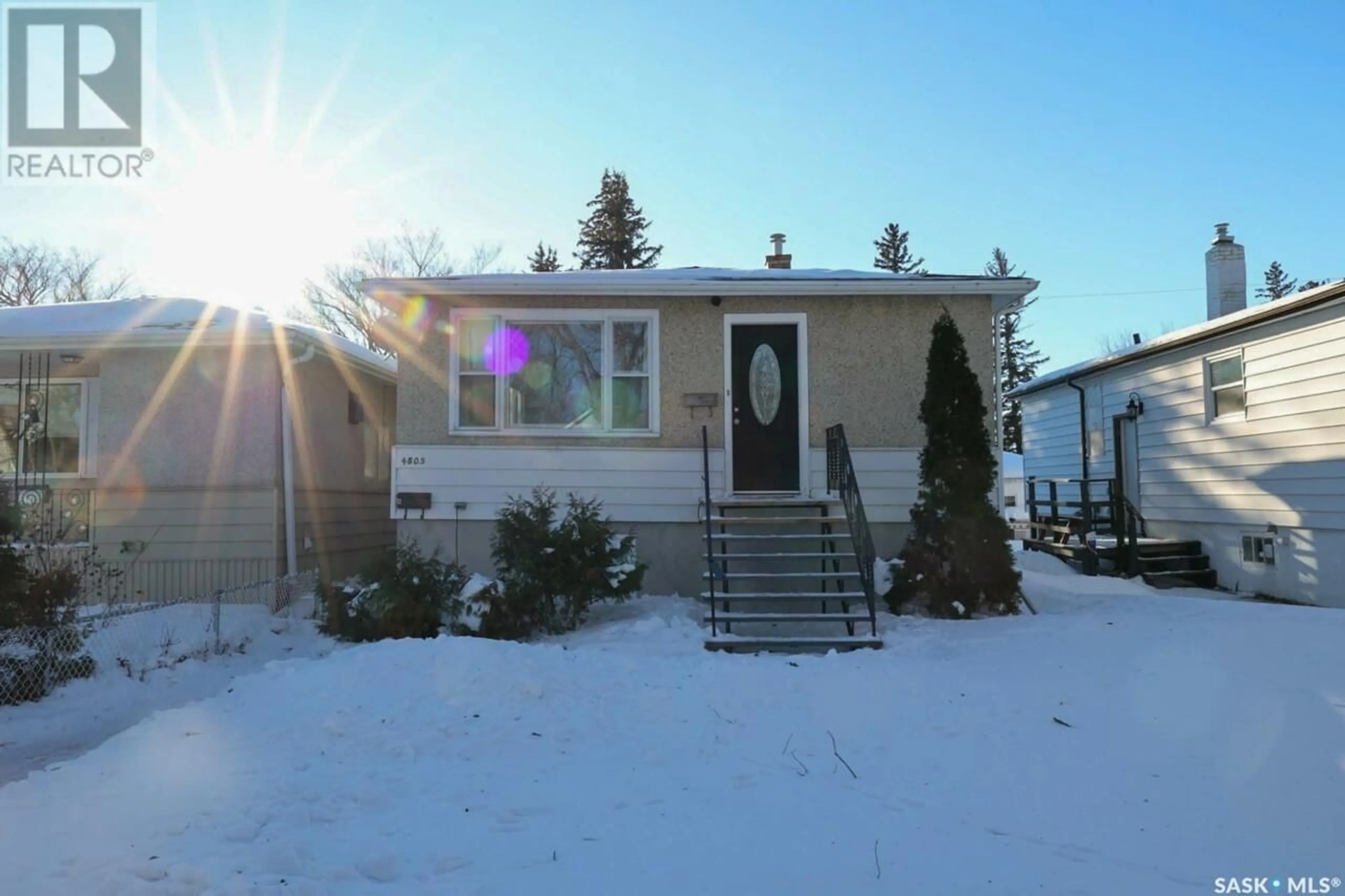 Home with vinyl exterior material, street for 4805 8TH AVENUE, Regina Saskatchewan S4T0W1