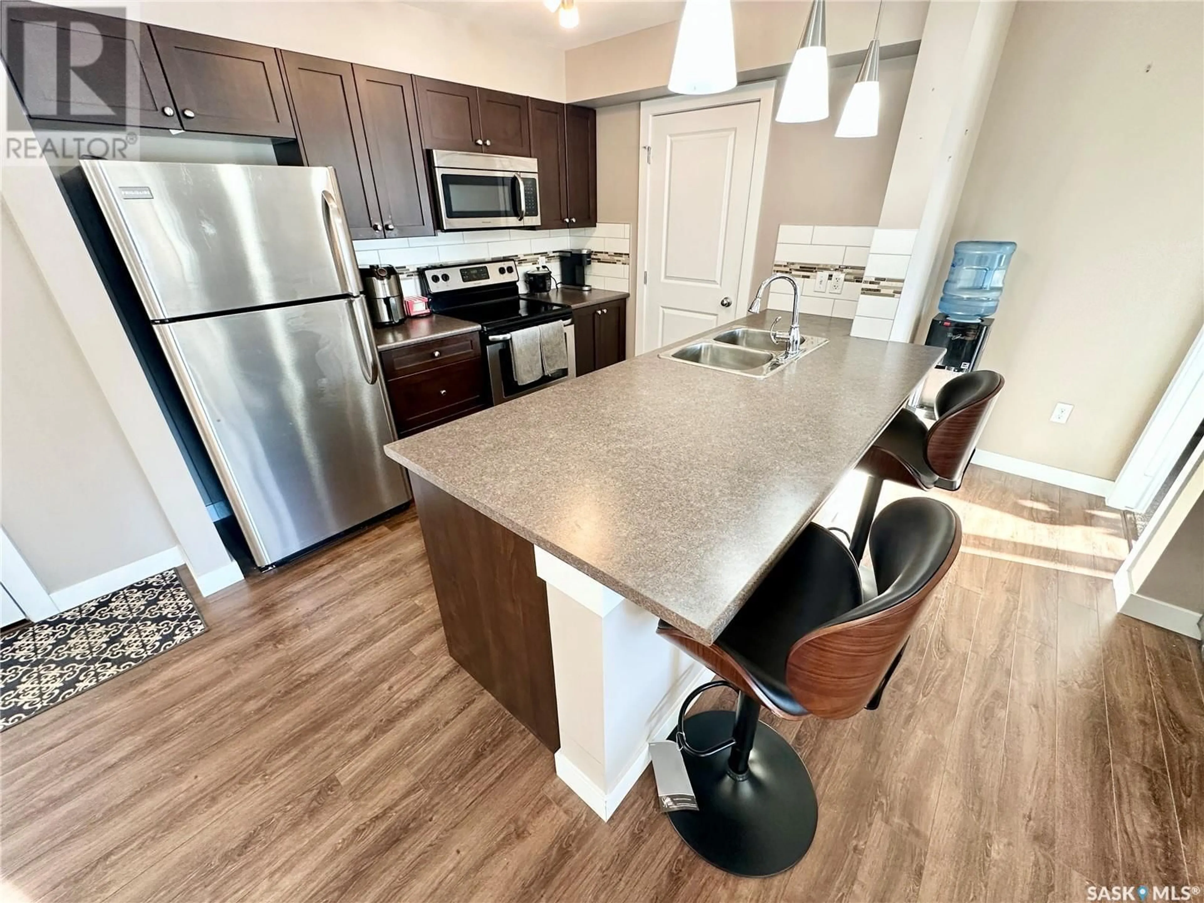 Open concept kitchen, unknown for 108 820 5th STREET, Weyburn Saskatchewan S4H2V2