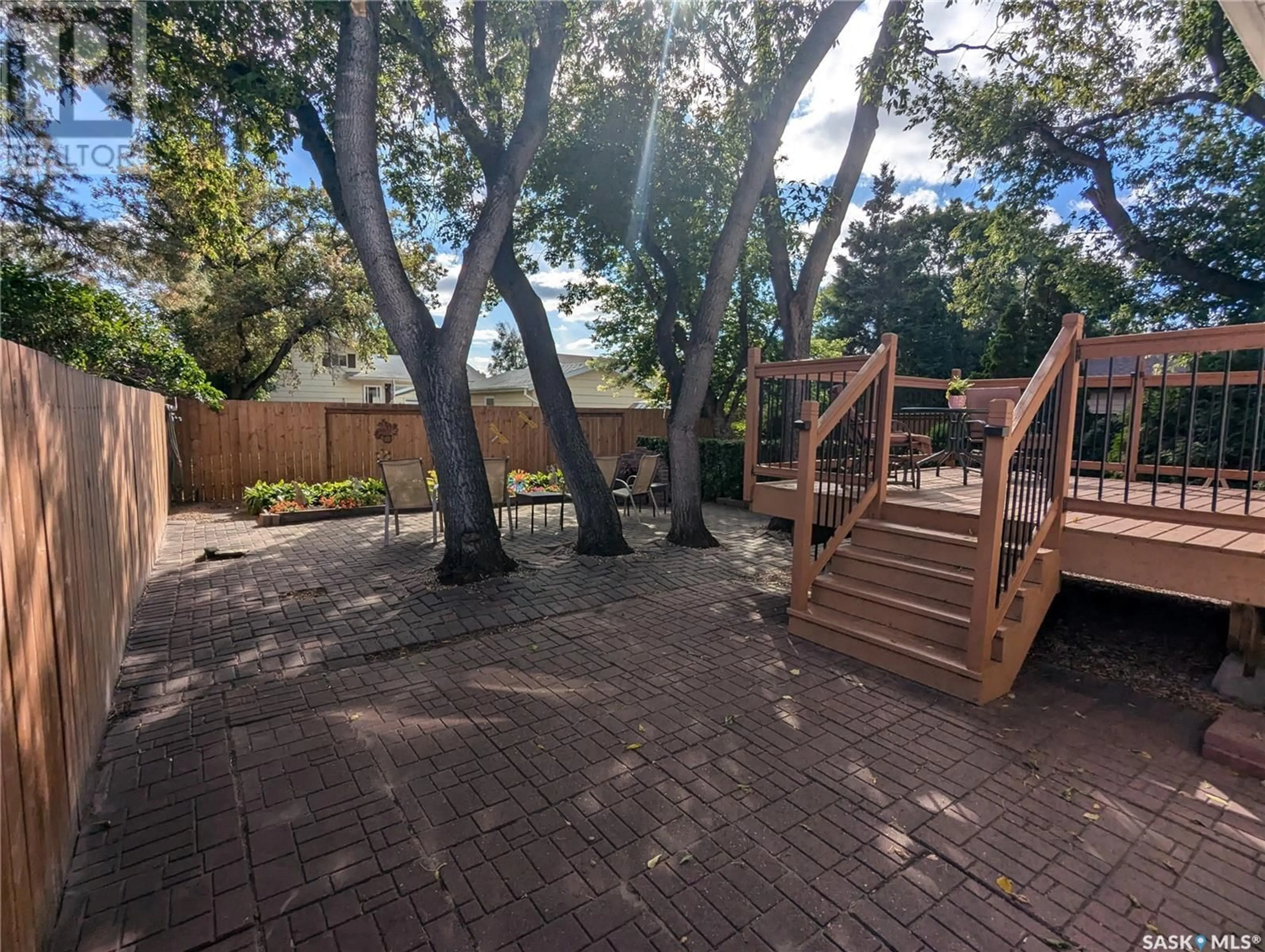 Patio, forest/trees view for 435 Needham WAY, Saskatoon Saskatchewan S7M4X6