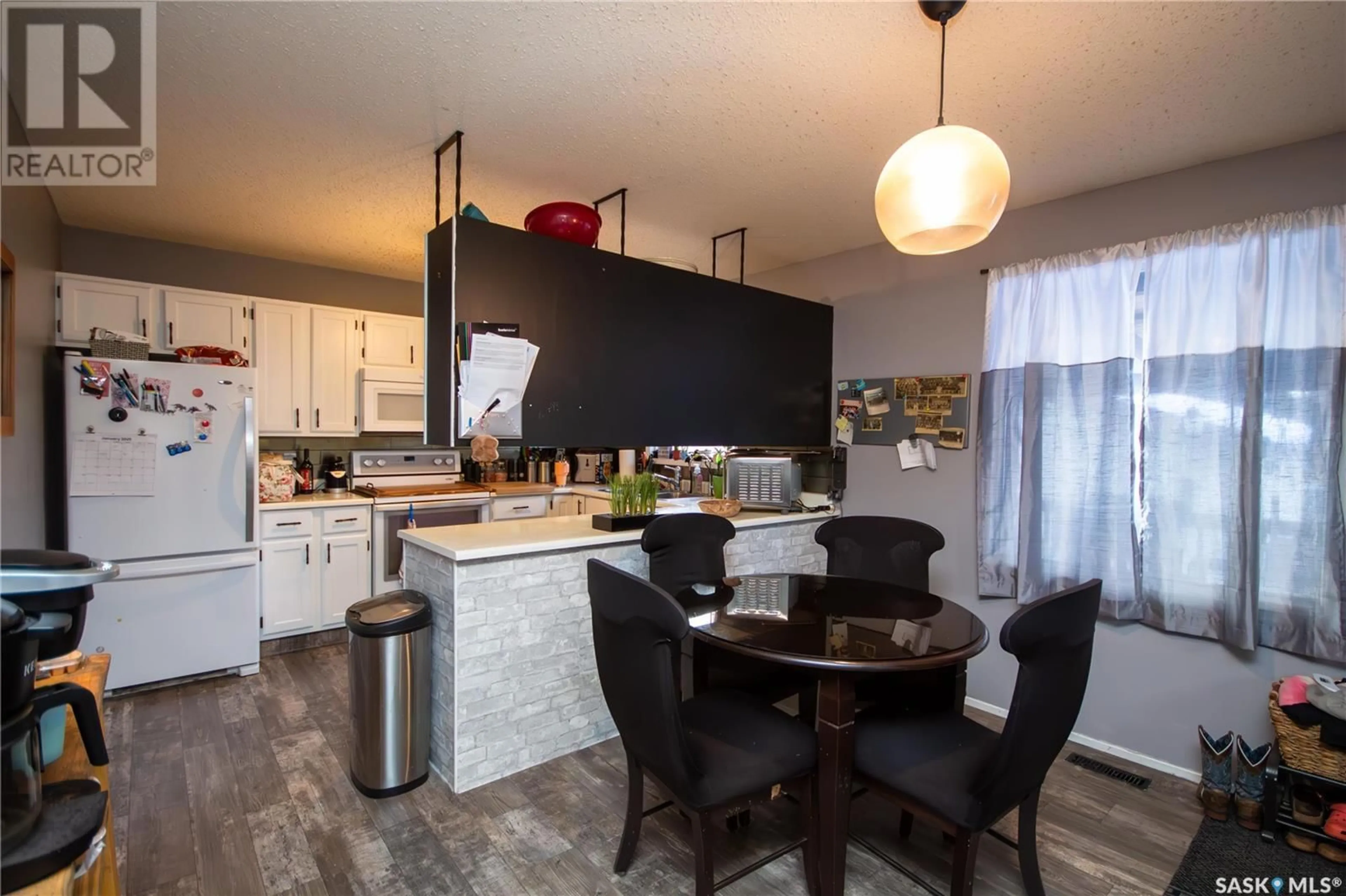 Open concept kitchen, unknown for 1381 95TH STREET, North Battleford Saskatchewan S9A0G3
