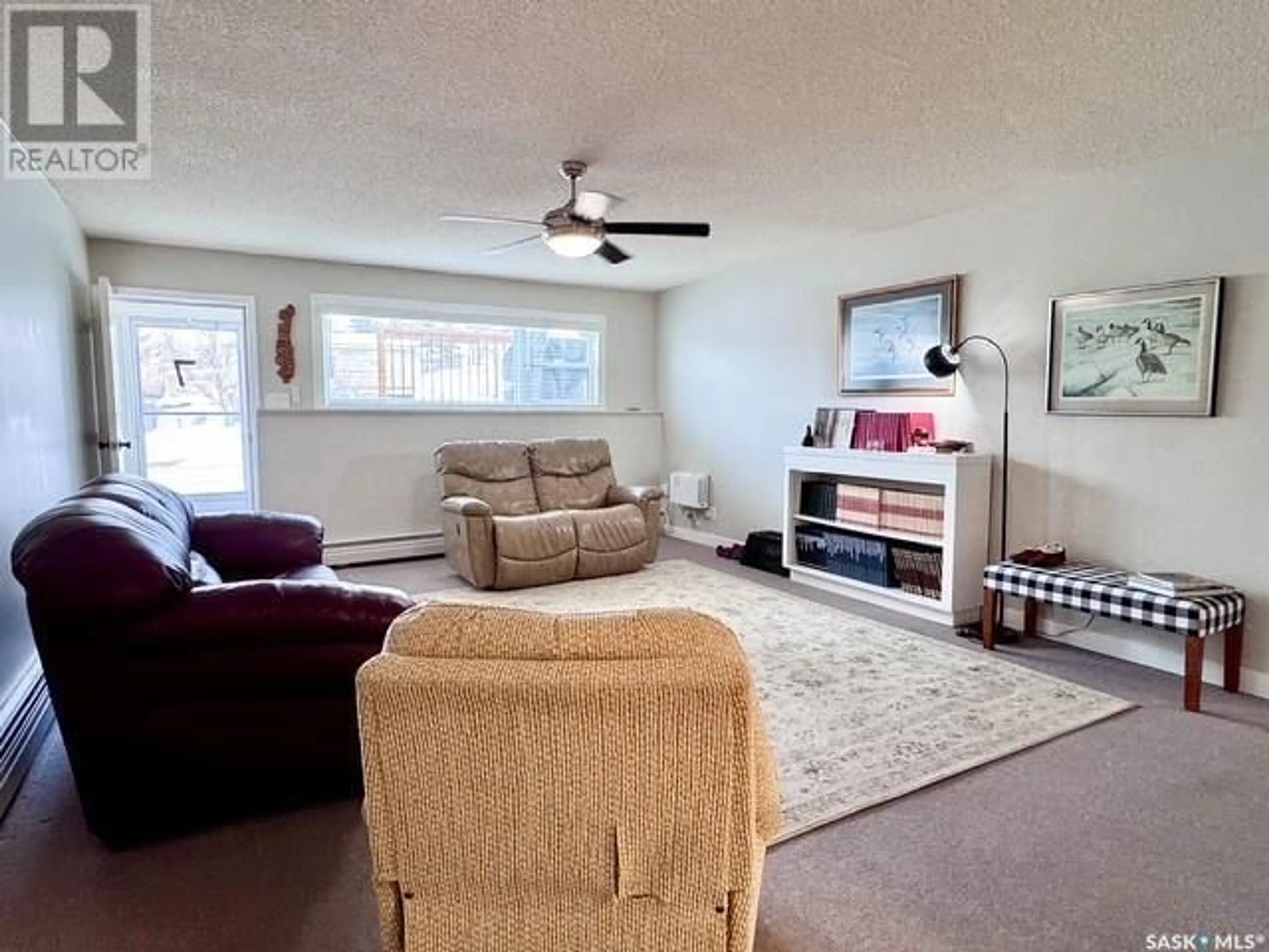 Living room with furniture, unknown for 7 330 13th AVENUE NE, Swift Current Saskatchewan S9H2W1