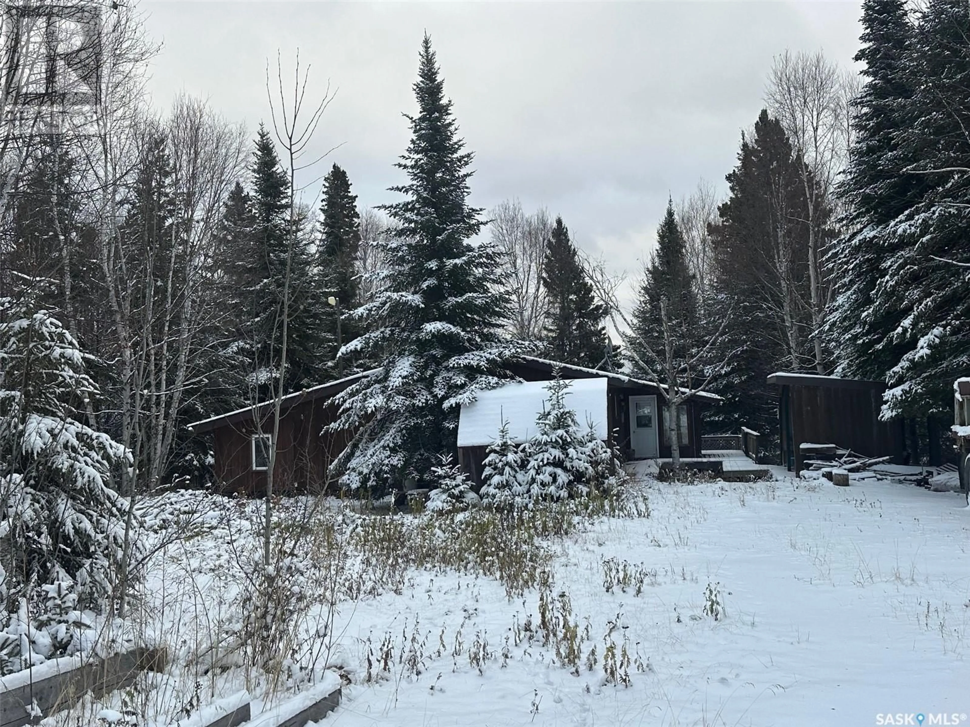A pic from outside/outdoor area/front of a property/back of a property/a pic from drone, forest/trees view for 1010 WASKOS DRIVE, Northern Admin District Saskatchewan S0J3G0