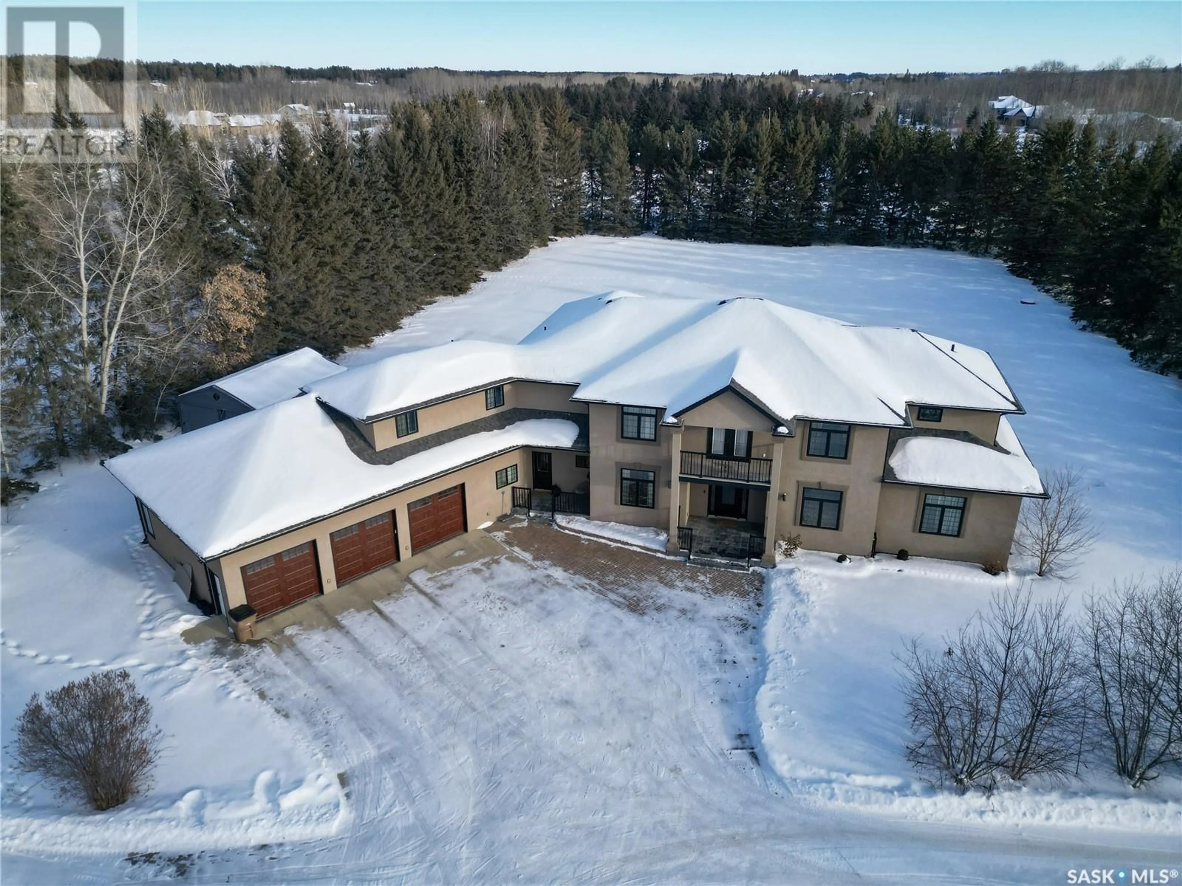 A pic from outside/outdoor area/front of a property/back of a property/a pic from drone, building for 374 Cedar AVENUE, Buckland Rm No. 491 Saskatchewan S6V5R3