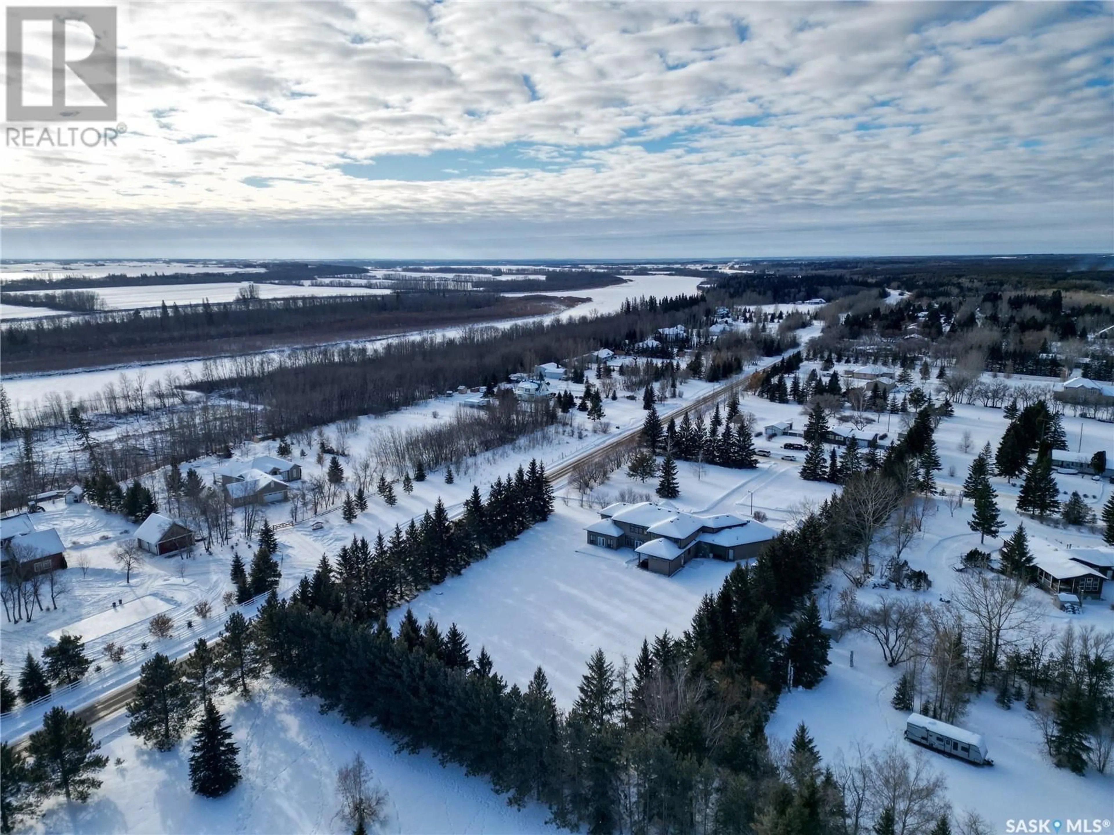 A pic from outside/outdoor area/front of a property/back of a property/a pic from drone, water/lake/river/ocean view for 374 Cedar AVENUE, Buckland Rm No. 491 Saskatchewan S6V5R3