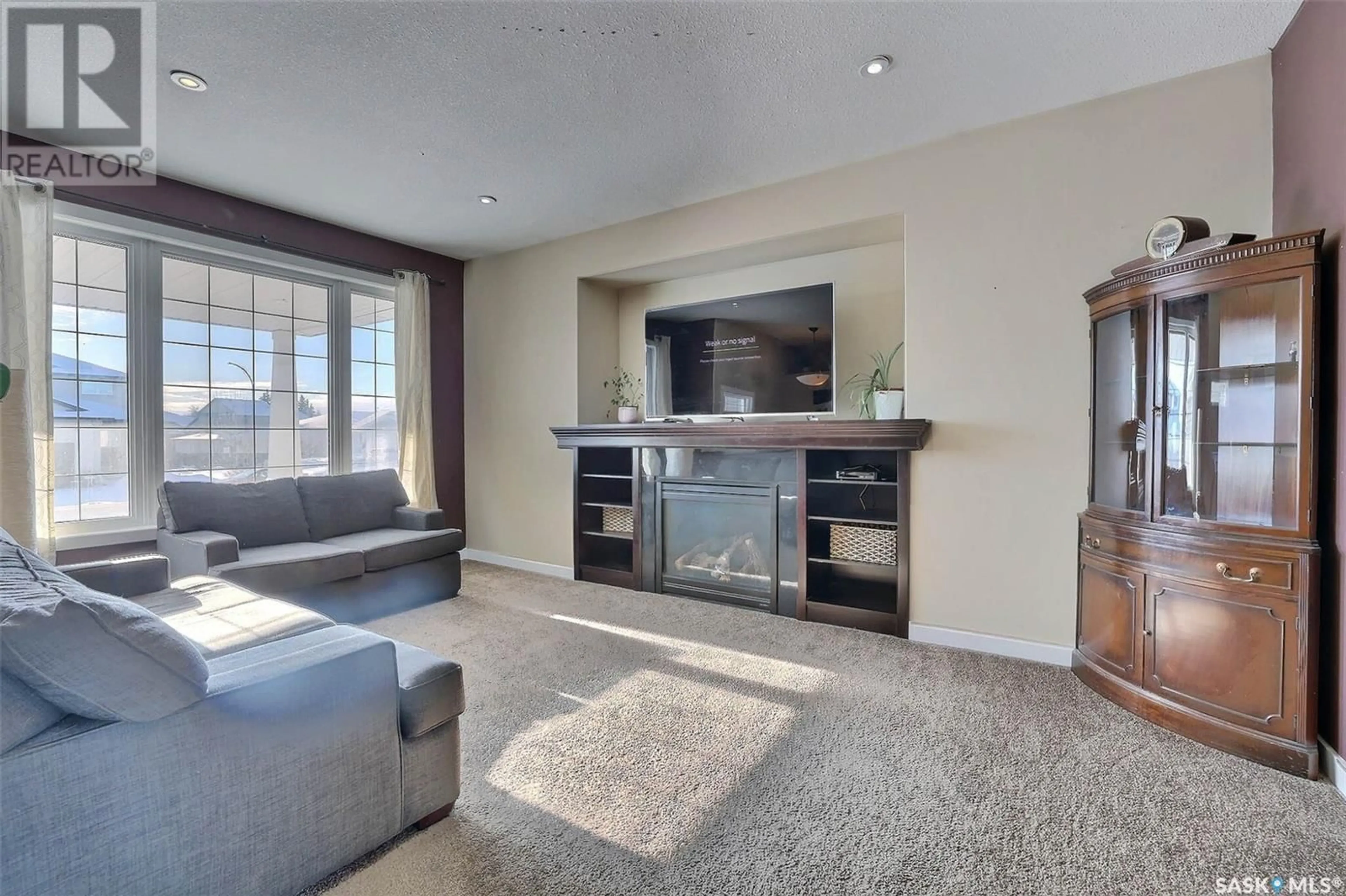 Living room with furniture, unknown for 2026 Norman Mackenzie ROAD, Regina Saskatchewan S4X0A6