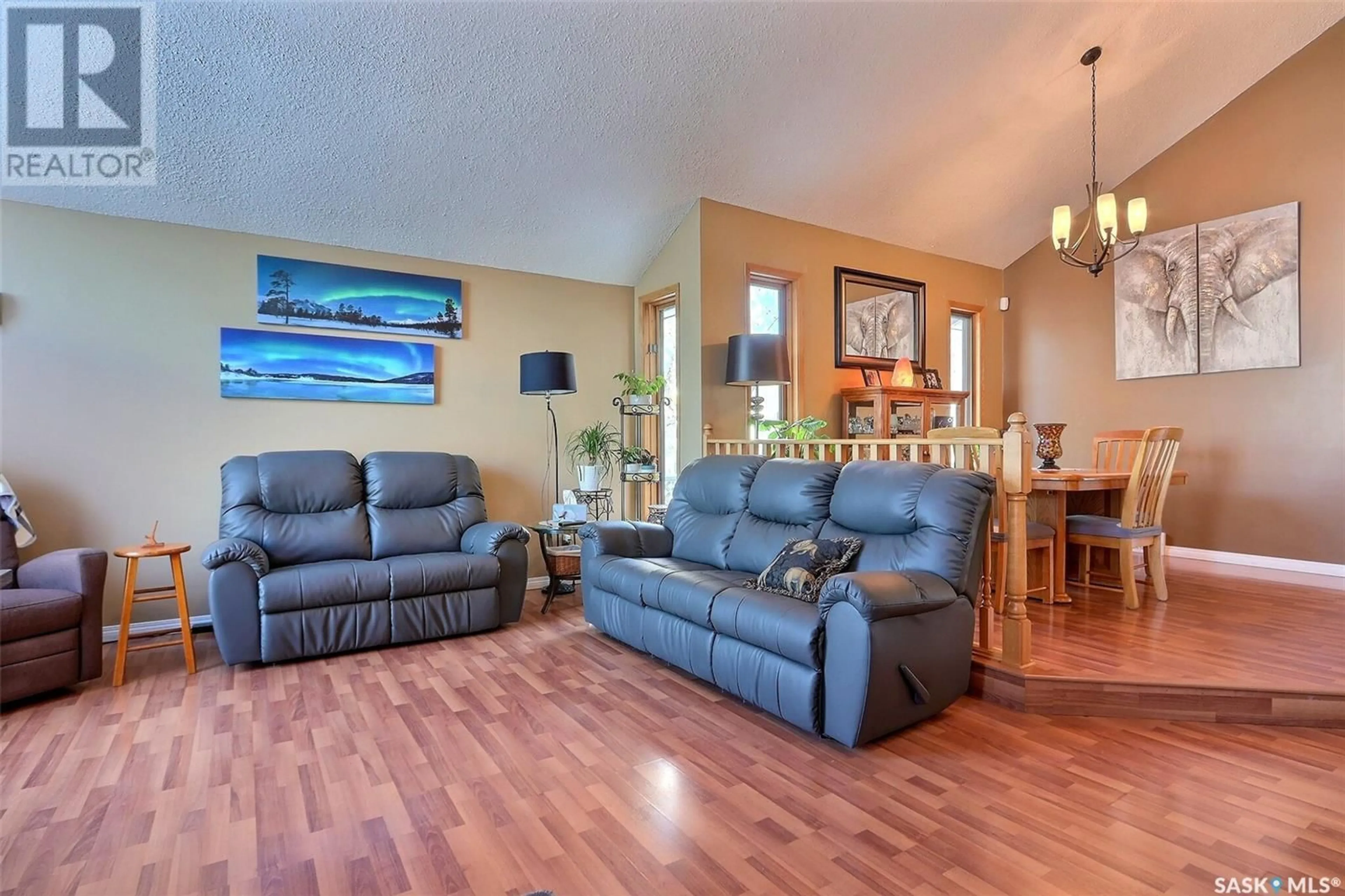 Living room with furniture, wood/laminate floor for 646 Sylvan ROAD, Prince Albert Saskatchewan S6V7R7