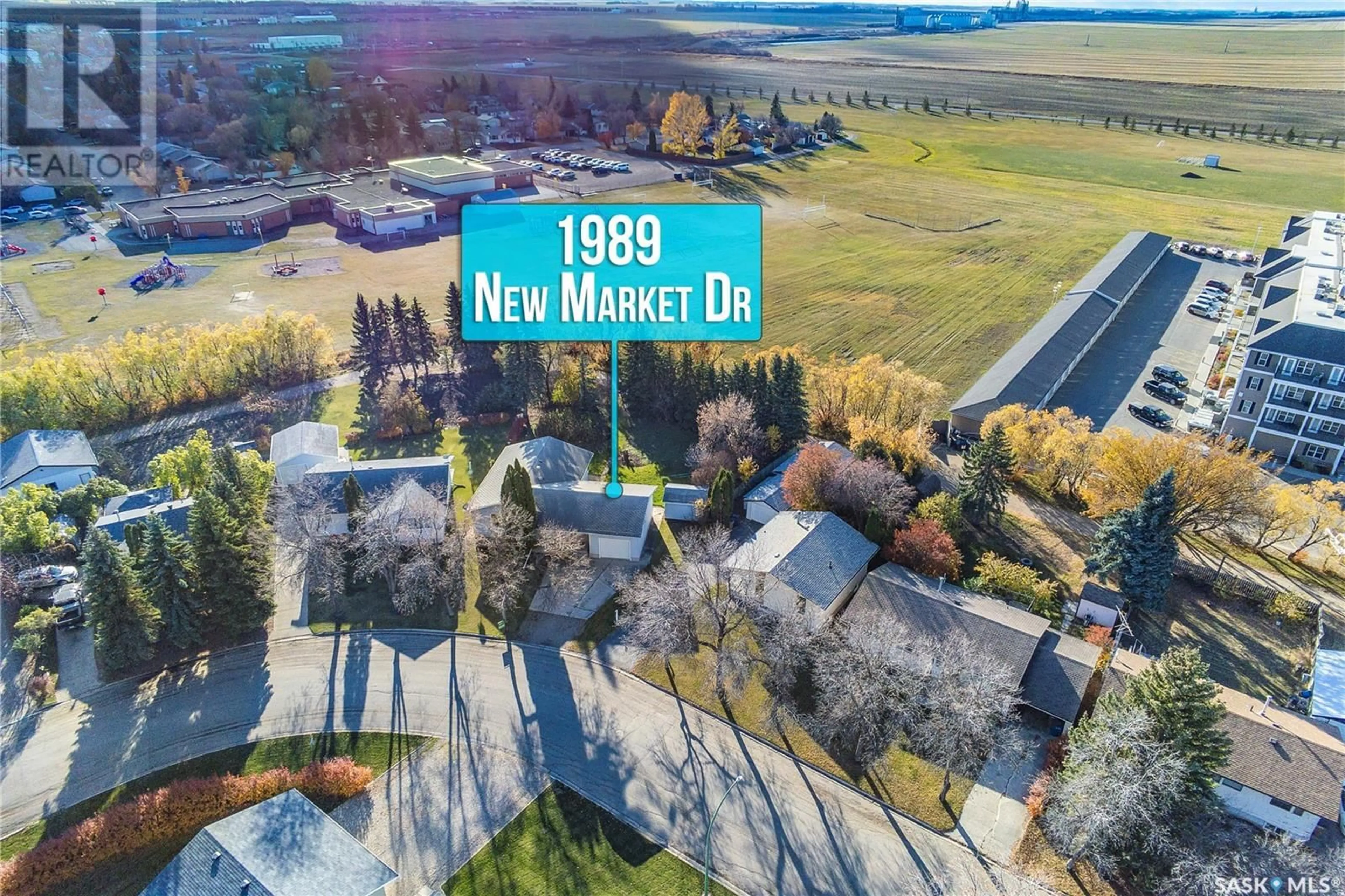 A pic from outside/outdoor area/front of a property/back of a property/a pic from drone, street for 1989 New Market DRIVE, Tisdale Saskatchewan S0E1T0