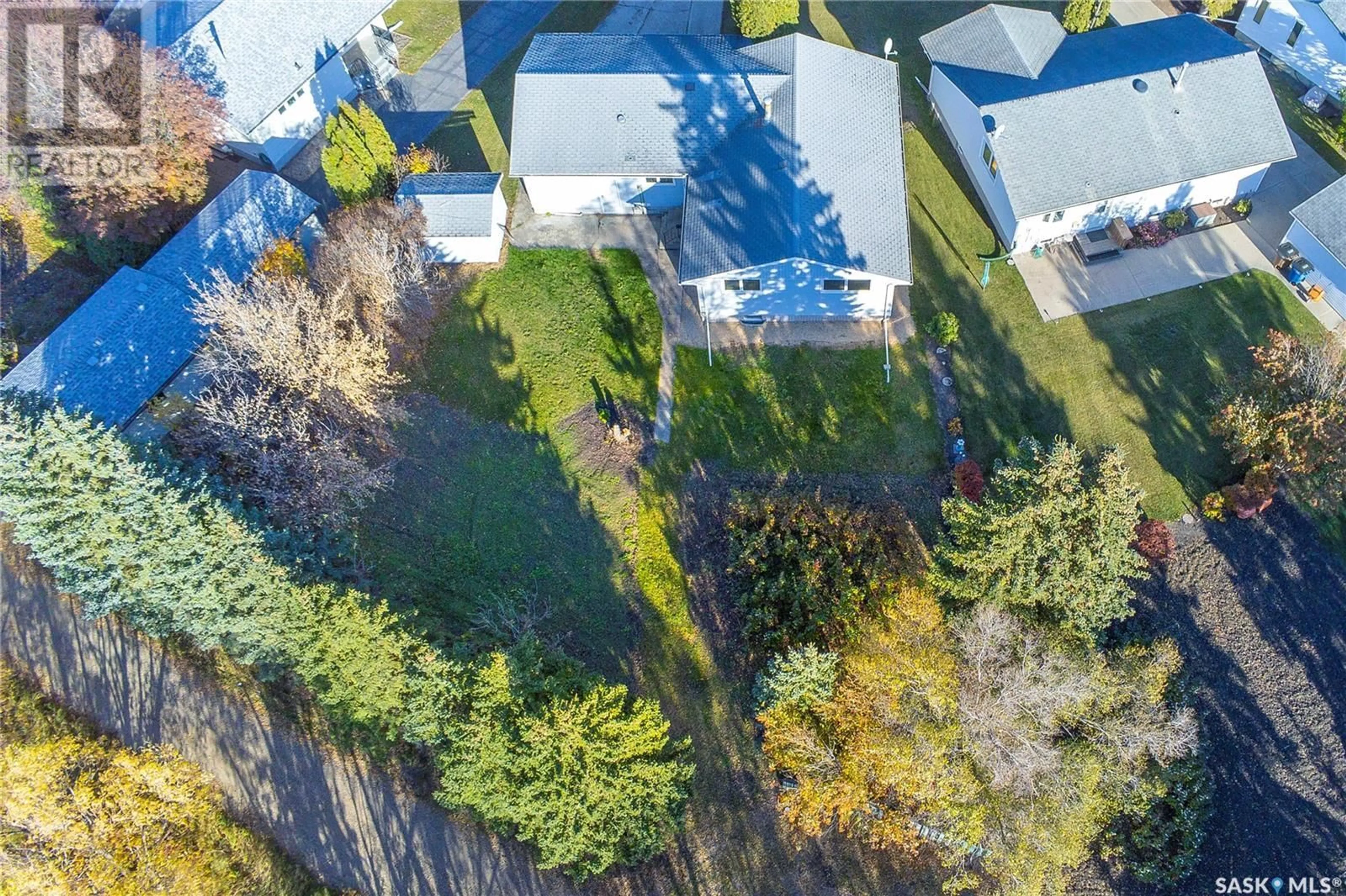 A pic from outside/outdoor area/front of a property/back of a property/a pic from drone, forest/trees view for 1989 New Market DRIVE, Tisdale Saskatchewan S0E1T0