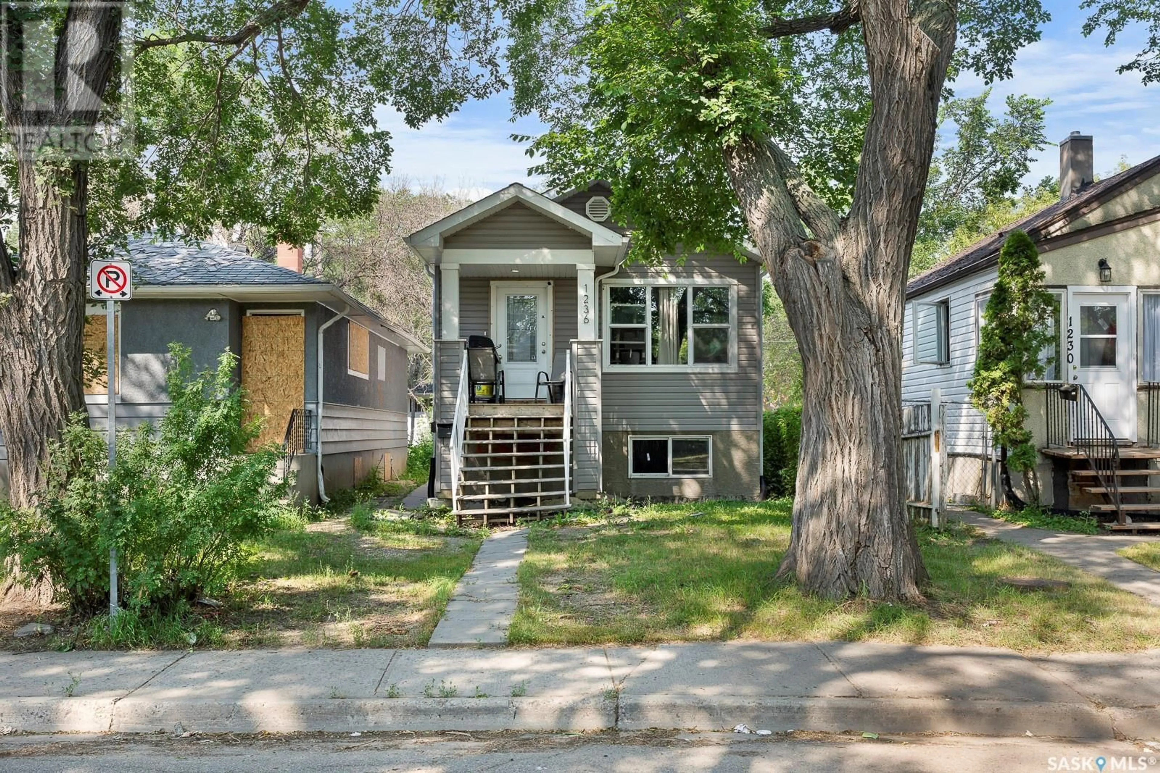 Home with vinyl exterior material, street for 1236 RAE STREET, Regina Saskatchewan S4T2C1