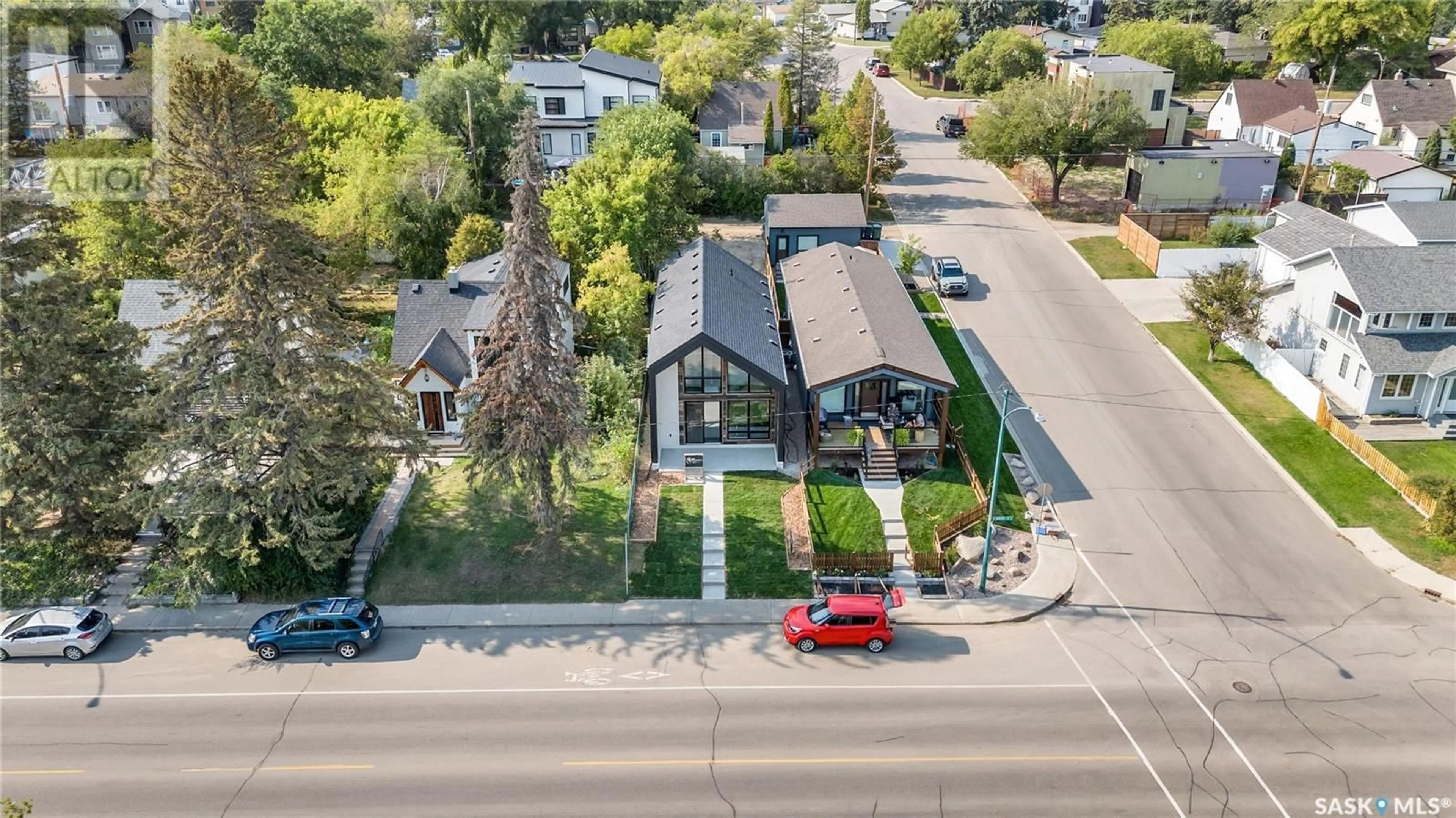 A pic from outside/outdoor area/front of a property/back of a property/a pic from drone, street for 1421 Spadina CRESCENT E, Saskatoon Saskatchewan S7K3J2