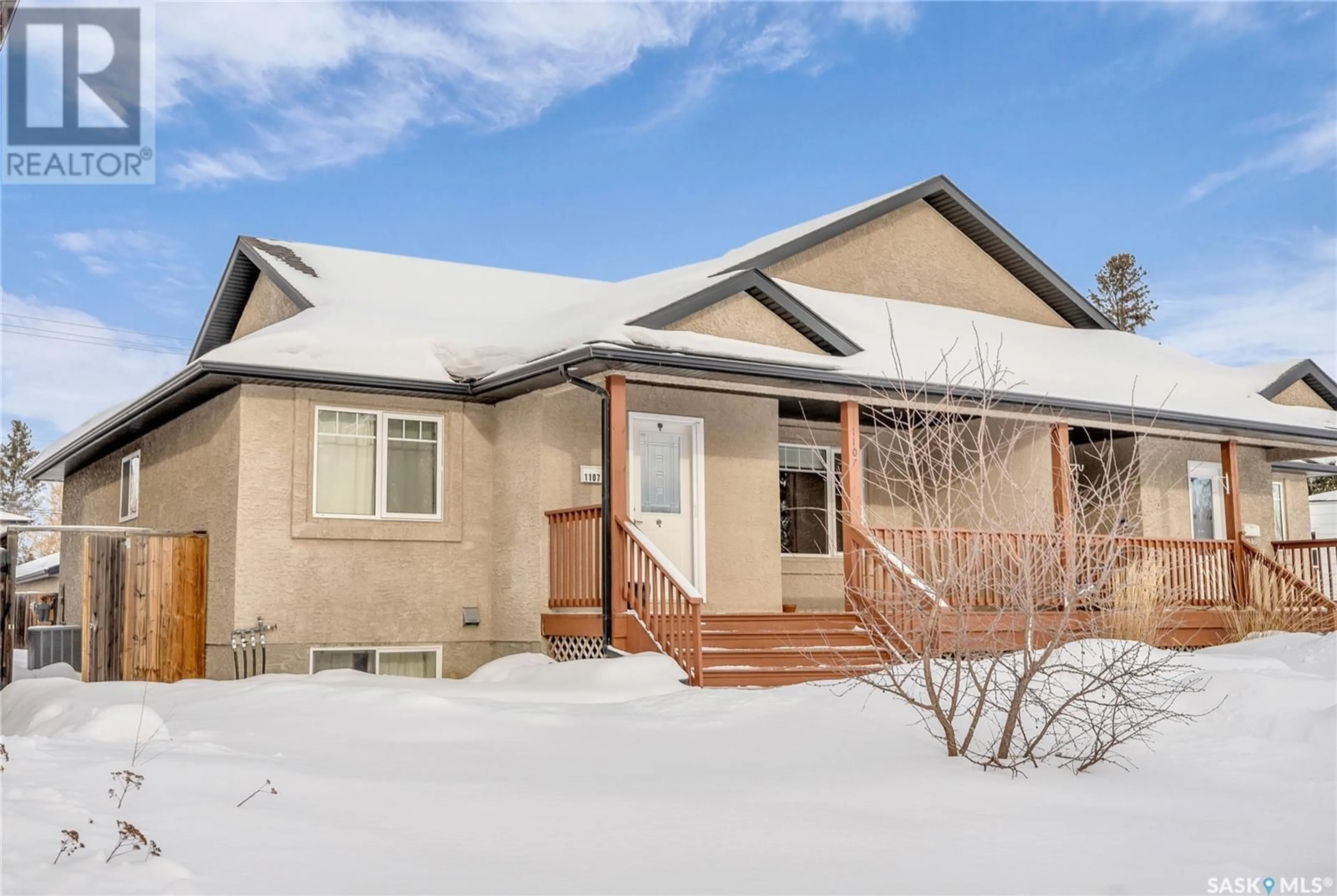 Home with vinyl exterior material, street for 1107 6th STREET E, Saskatoon Saskatchewan S7H1E4