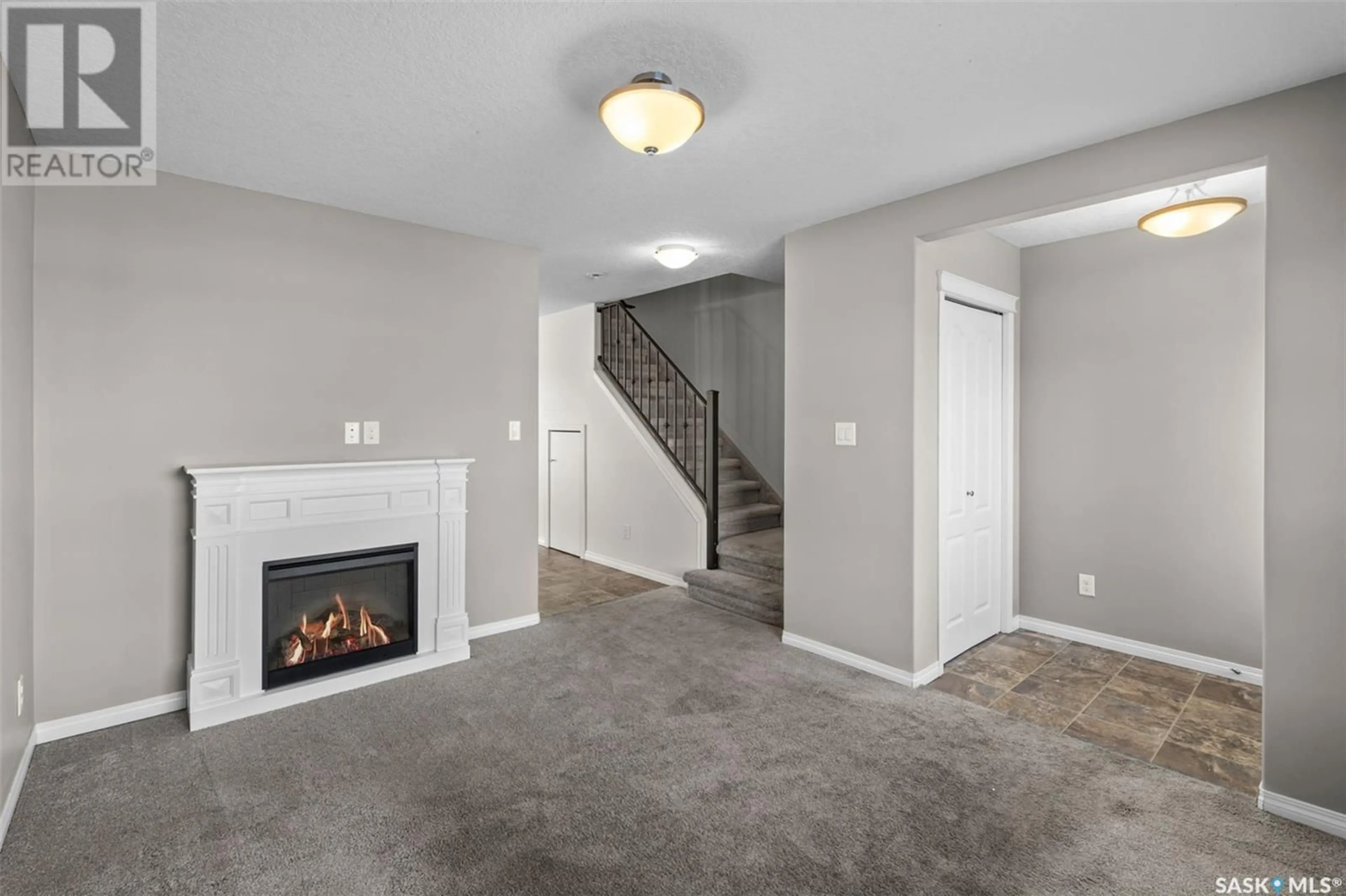 Living room with furniture, carpet floor for 102 103 Klassen CRESCENT, Saskatoon Saskatchewan S7R0J2