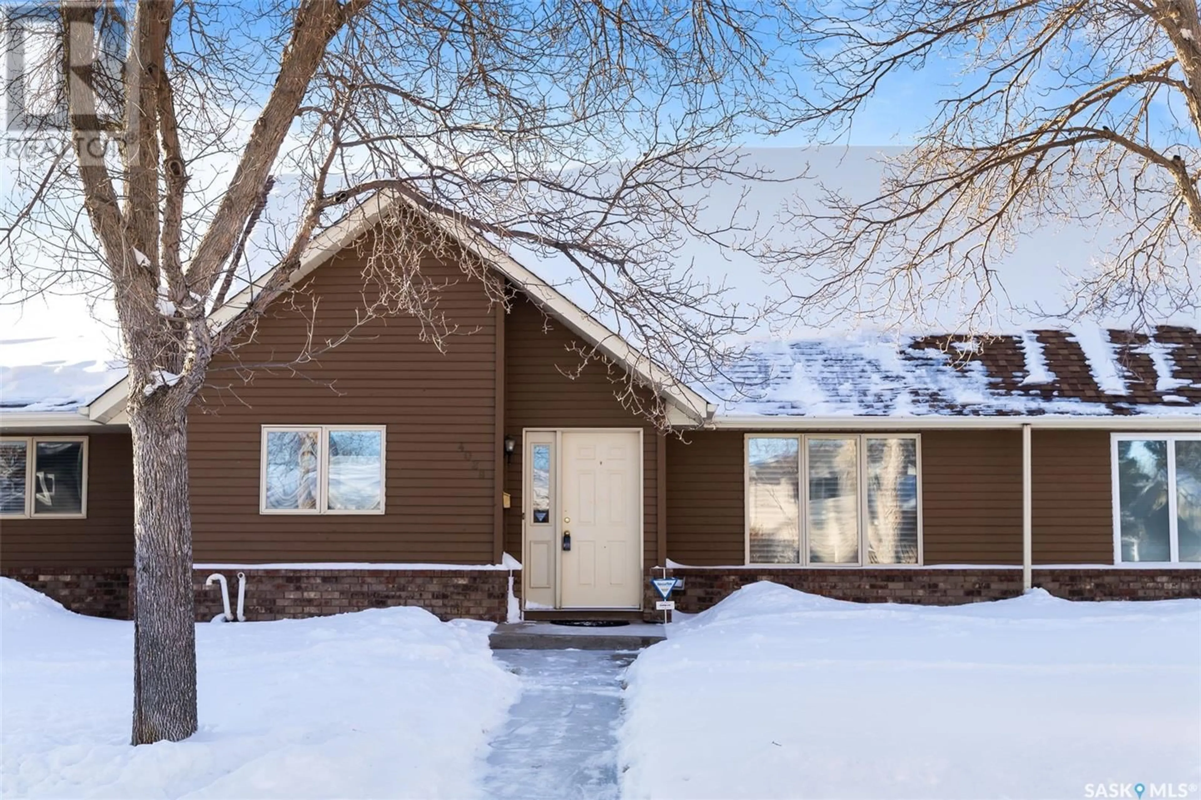 Home with vinyl exterior material, street for 4028 GARNET STREET, Regina Saskatchewan S4S3G7