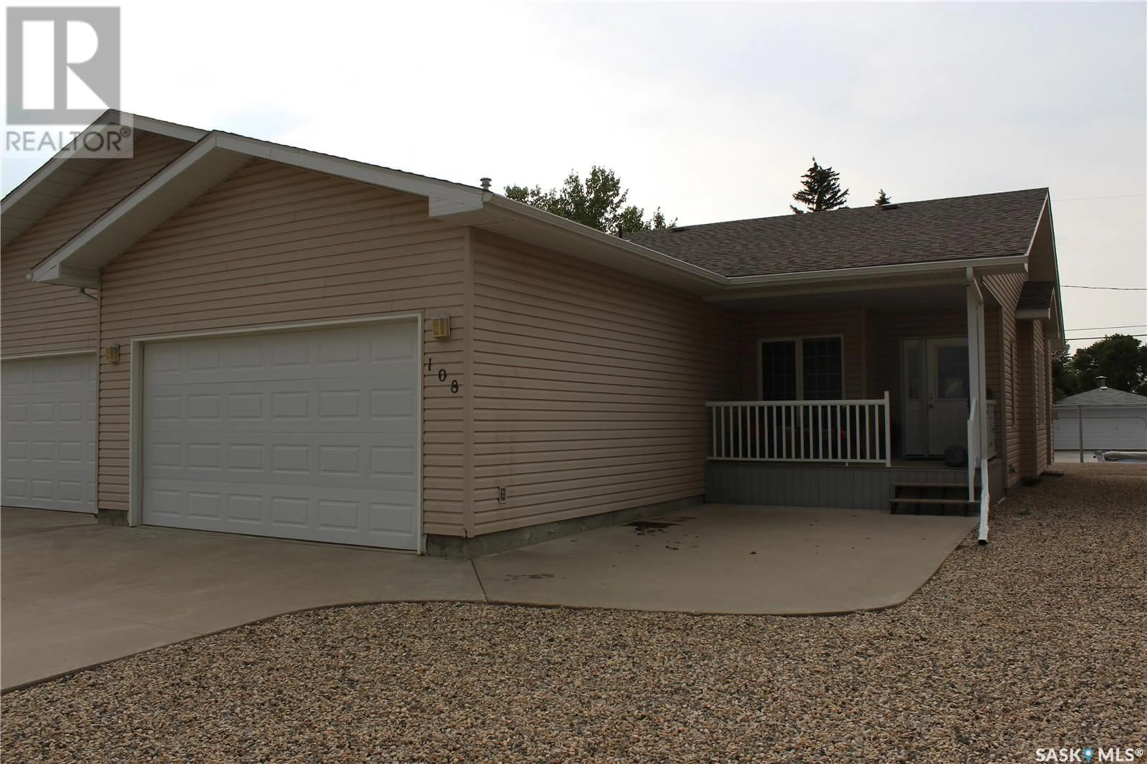 Home with vinyl exterior material, street for 108 Erickson STREET, Midale Saskatchewan S0C1S0