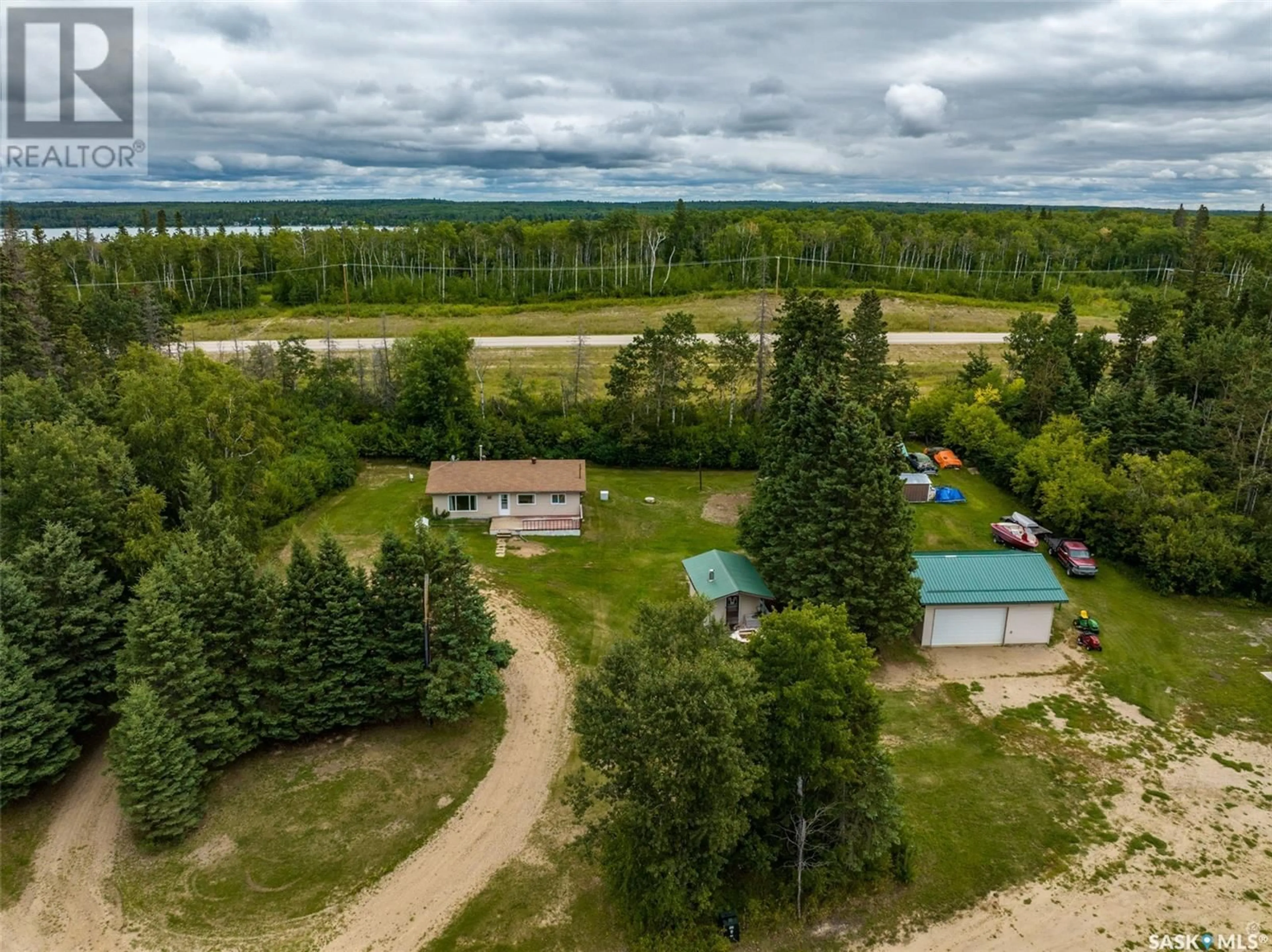 A pic from outside/outdoor area/front of a property/back of a property/a pic from drone, unknown for 402 Aspen PLACE, Paddockwood Rm No. 520 Saskatchewan S0J0N0