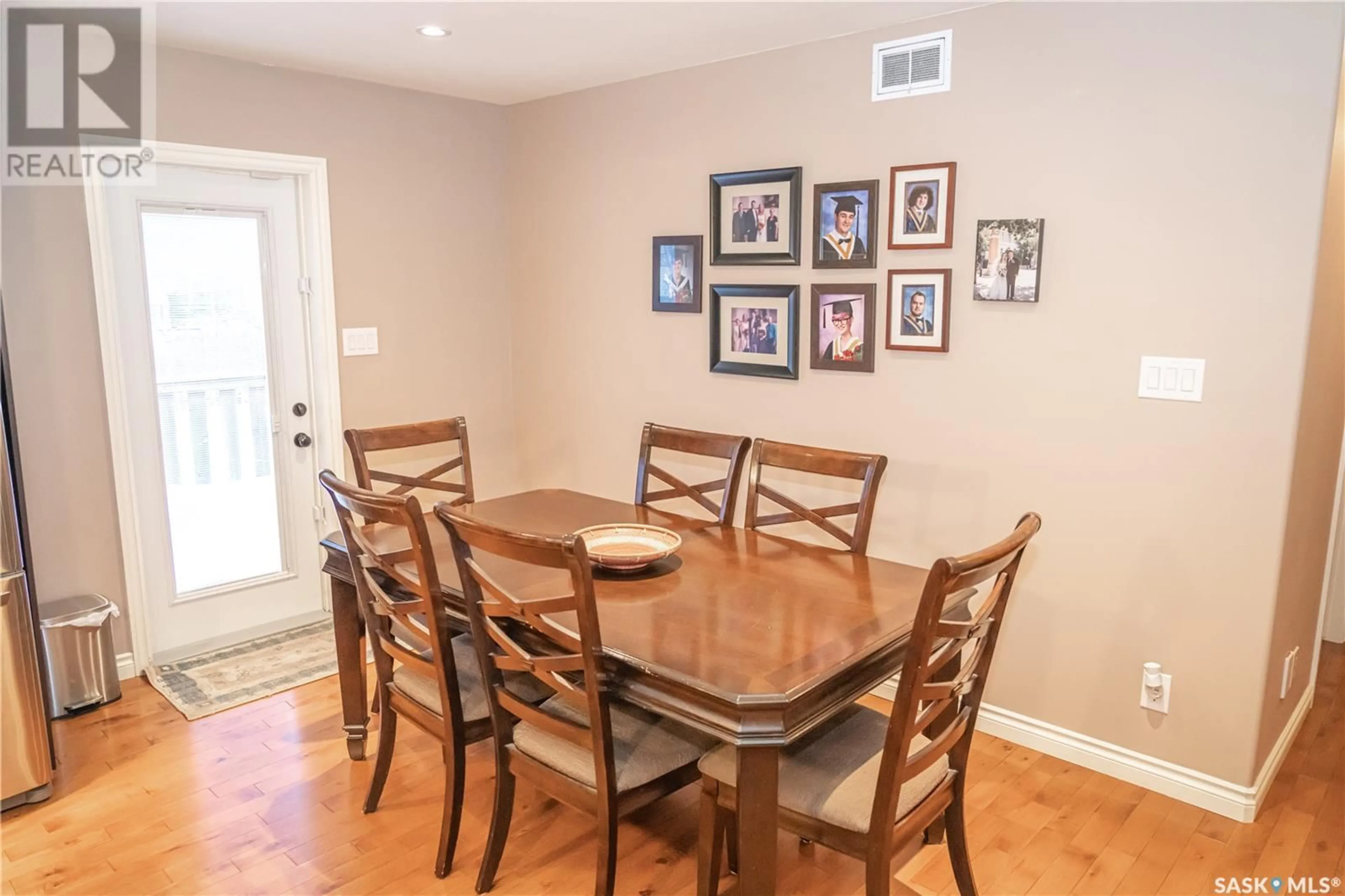 Dining room, wood/laminate floor for 520 Antler CRESCENT, Warman Saskatchewan S0K4S0