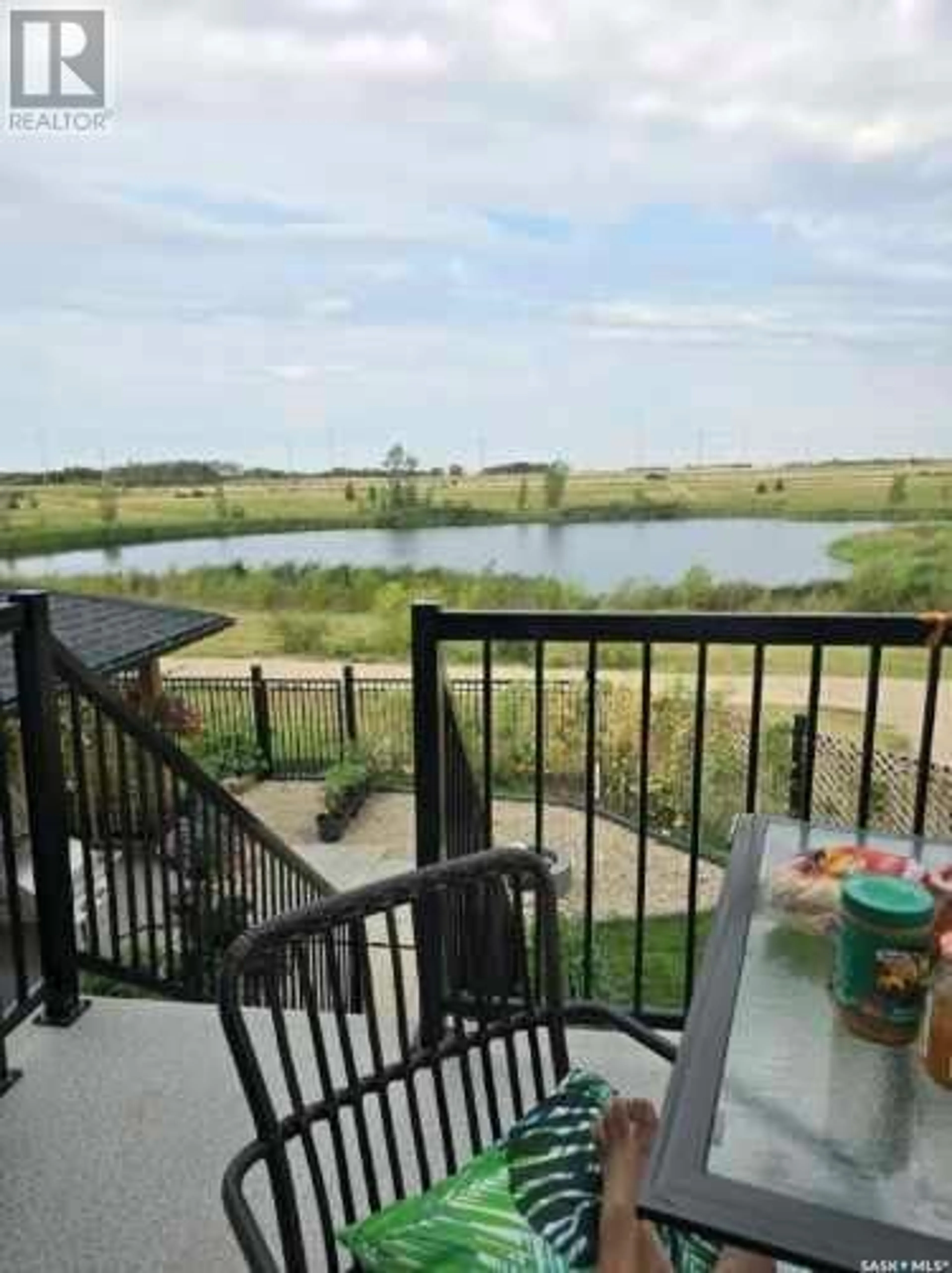 Patio, water/lake/river/ocean view for 243 Fortosky CRESCENT, Saskatoon Saskatchewan S7M5X5