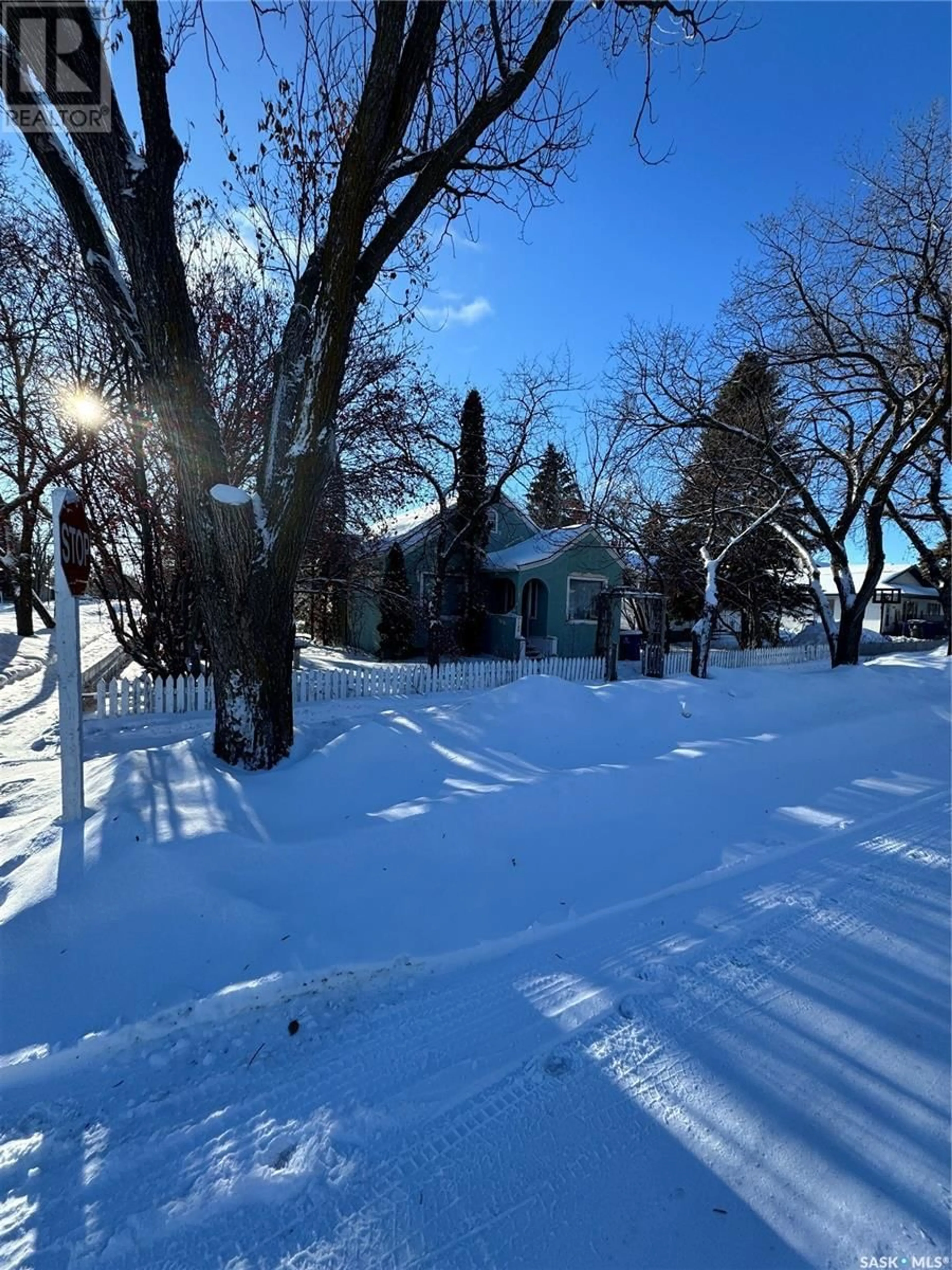 A pic from outside/outdoor area/front of a property/back of a property/a pic from drone, street for 120 1st STREET E, Langham Saskatchewan S0K0H8