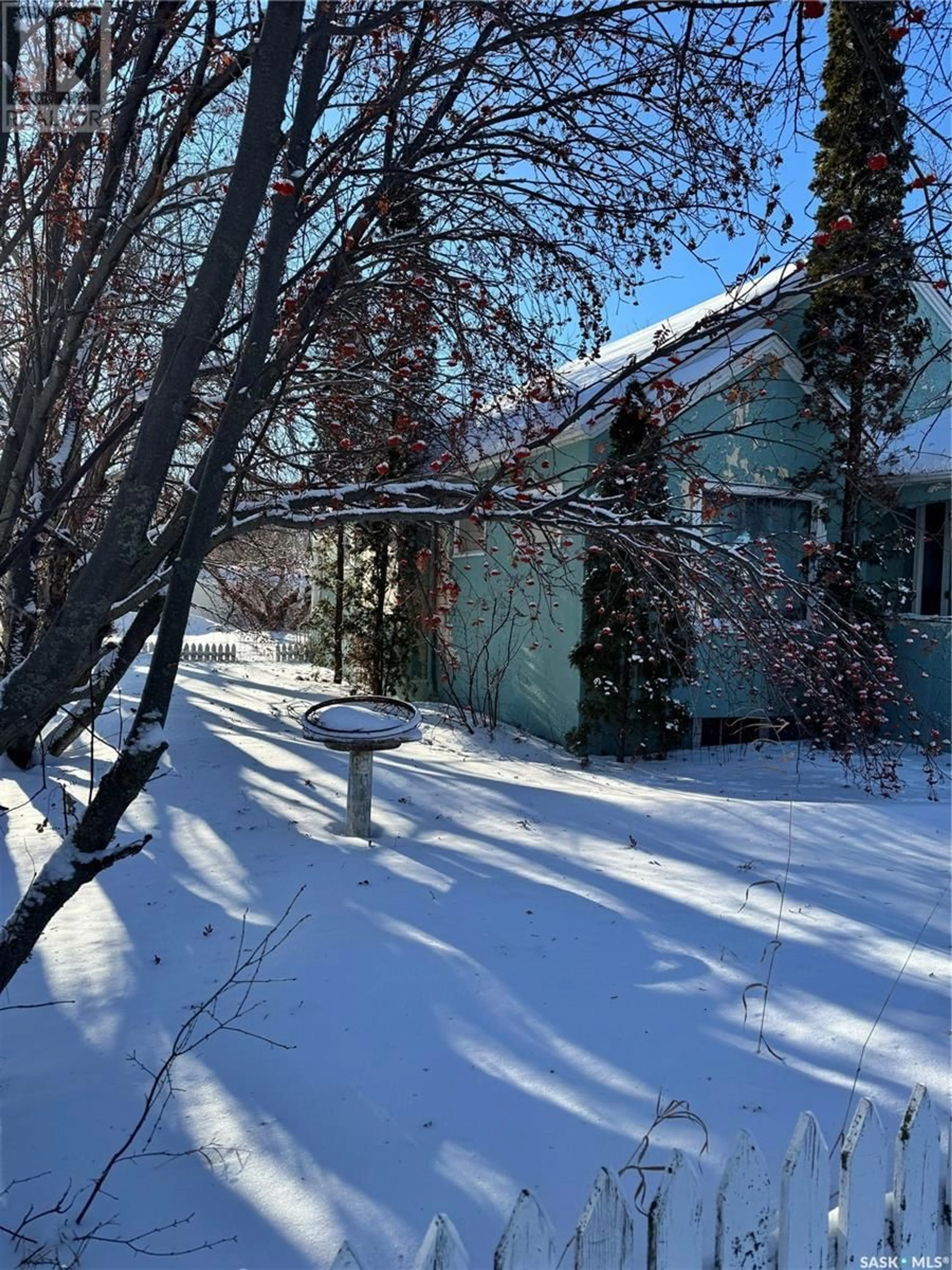 A pic from outside/outdoor area/front of a property/back of a property/a pic from drone, street for 120 1st STREET E, Langham Saskatchewan S0K0H8