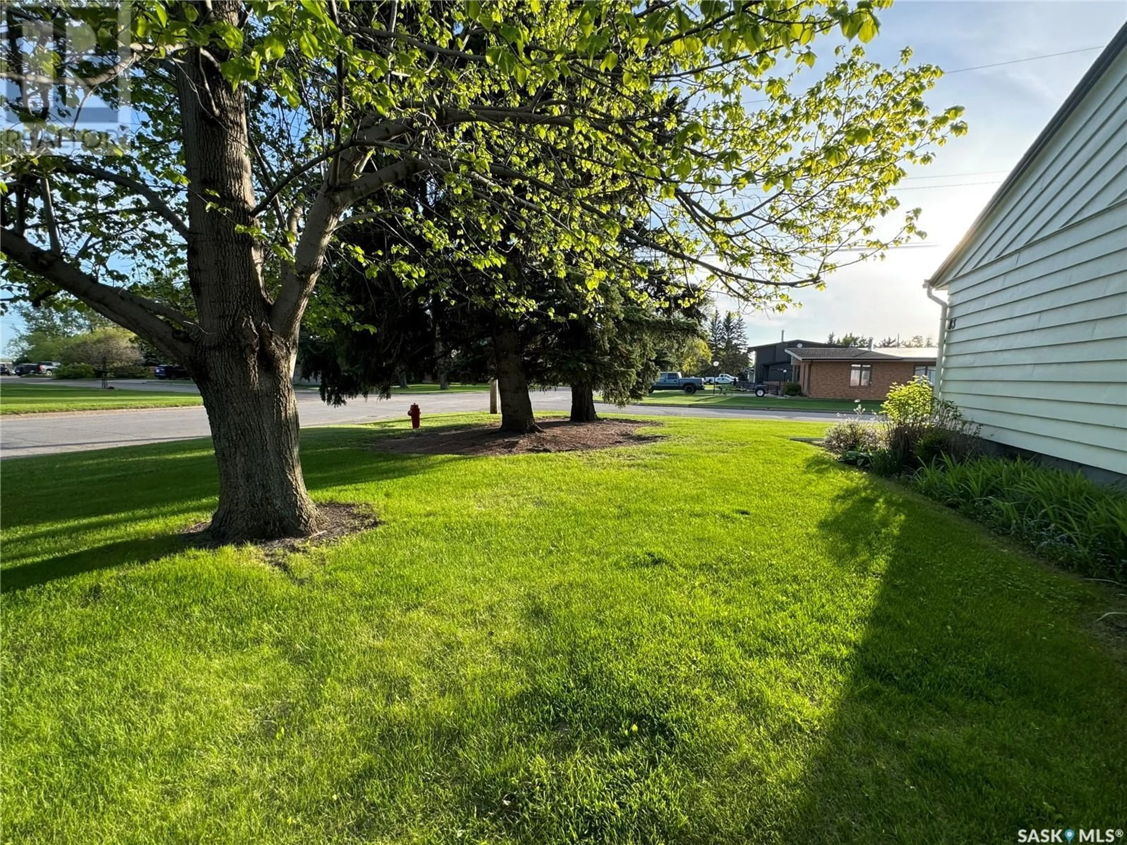 A pic from outside/outdoor area/front of a property/back of a property/a pic from drone, street for 83 Logan CRESCENT W, Yorkton Saskatchewan S3N0W3