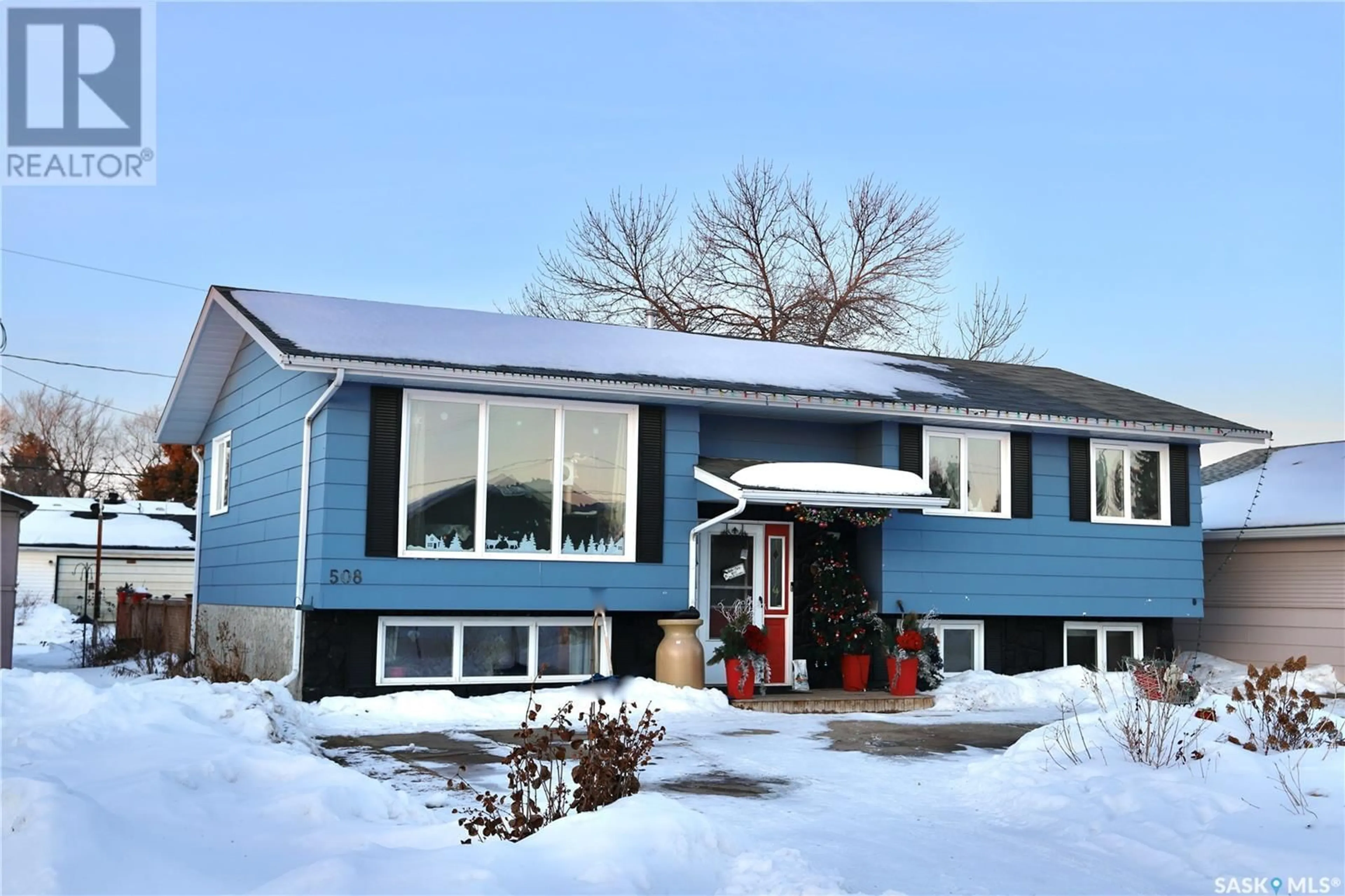 Home with vinyl exterior material, street for 508 3rd AVENUE E, Shellbrook Saskatchewan S0J2E0