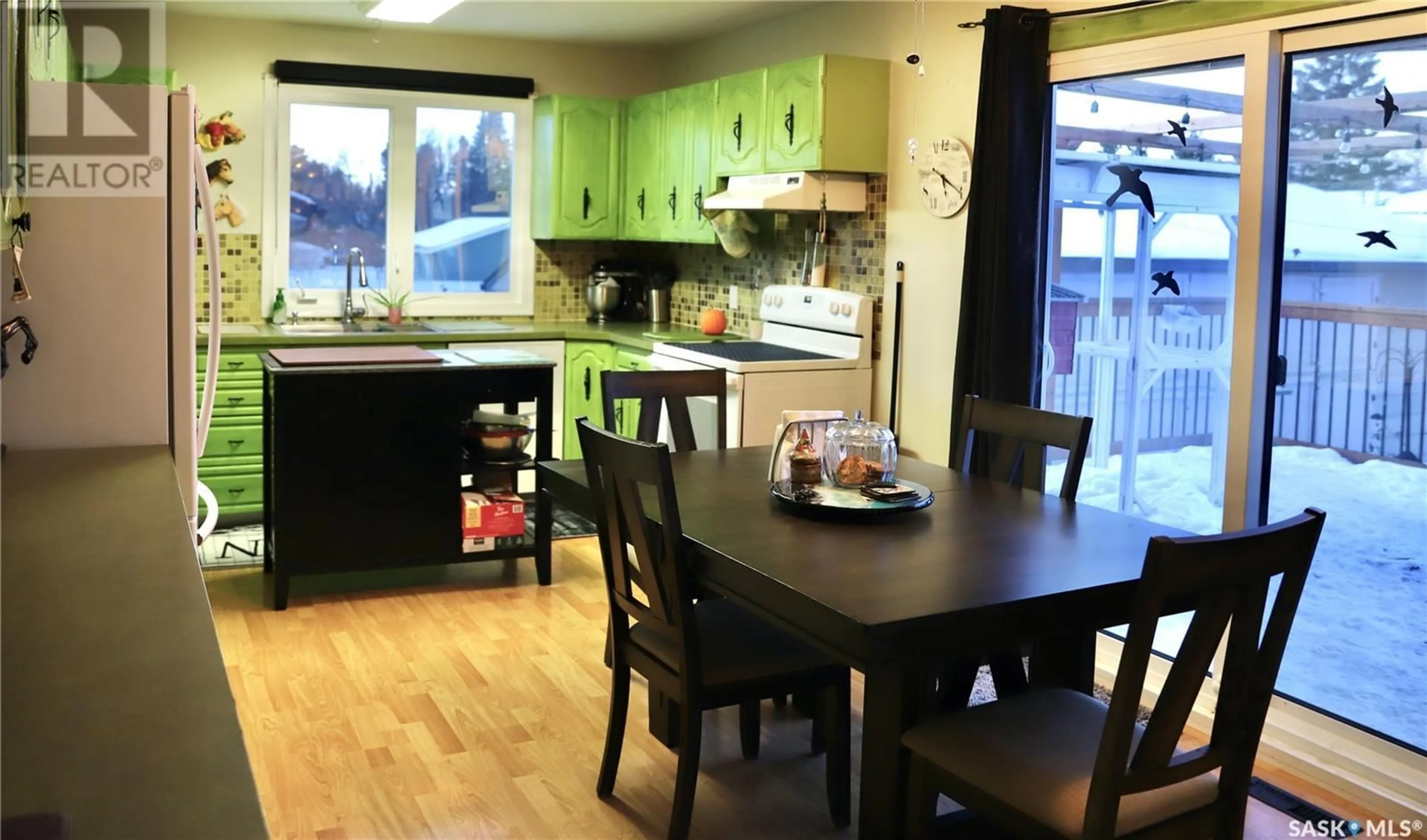 Open concept kitchen, wood/laminate floor for 508 3rd AVENUE E, Shellbrook Saskatchewan S0J2E0