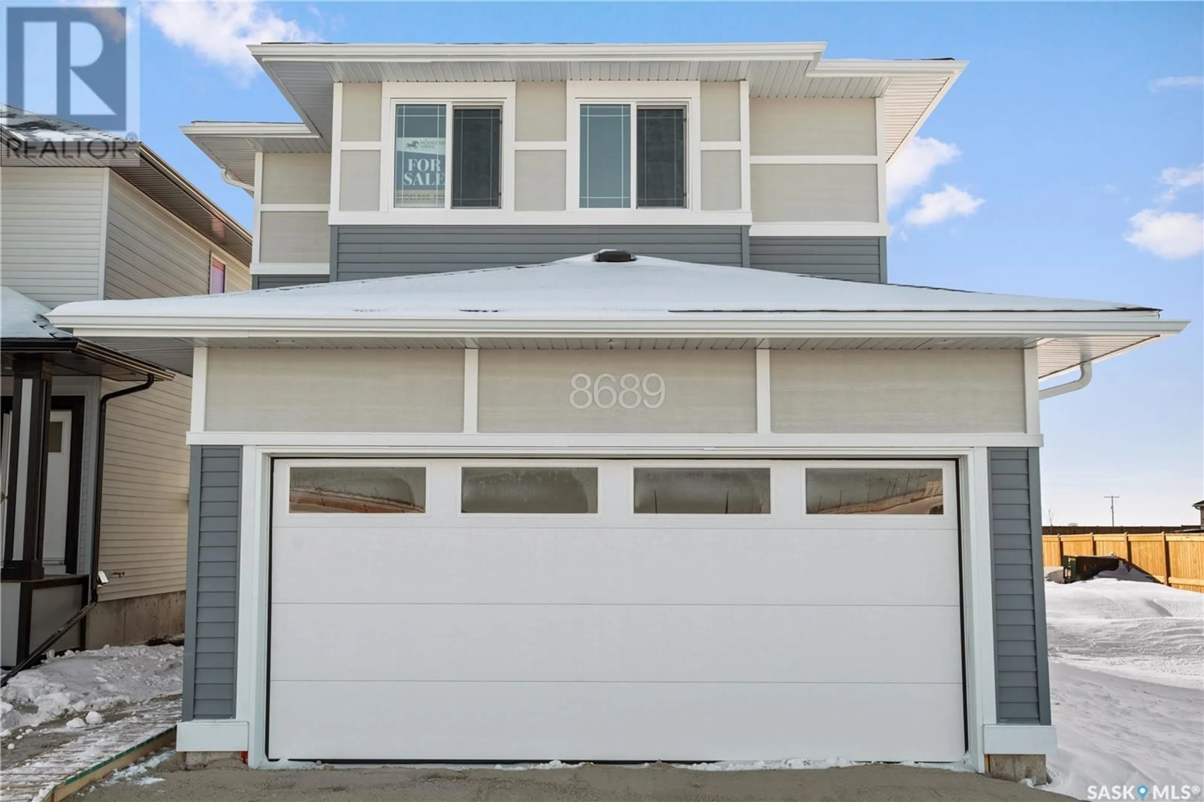 Home with vinyl exterior material, street for 8689 Wheat CRESCENT, Regina Saskatchewan S4Y0H4